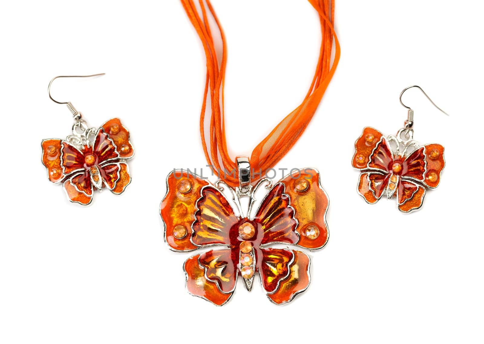 Butterfly necklace and earrings made of precious stones. Isolate on white.