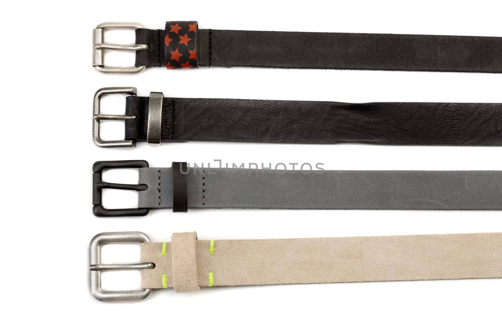 Four leather strap with buckles. Isolate on white.