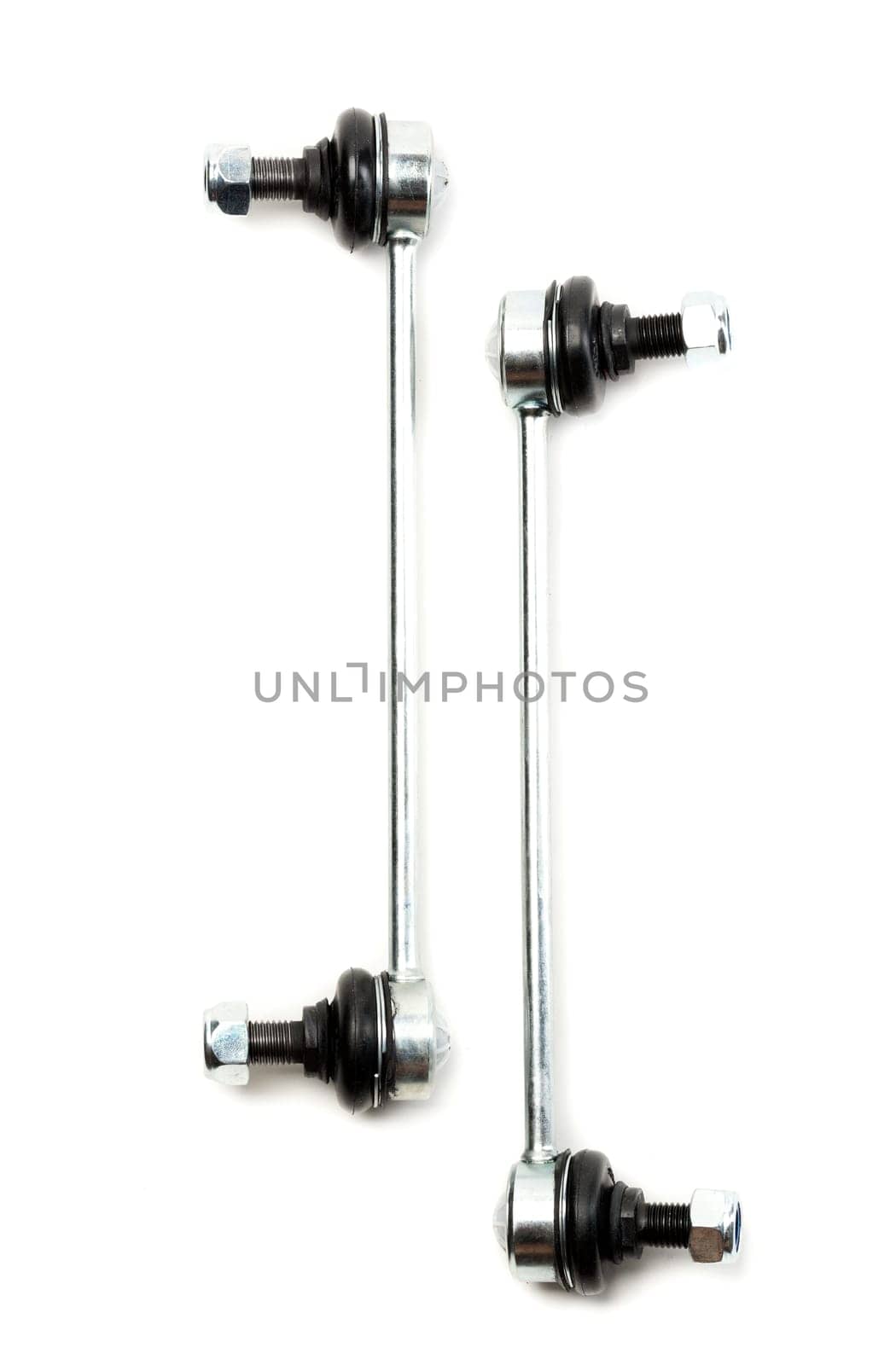 Close-up of two steel suspension arms of the vehicle. Isolate
