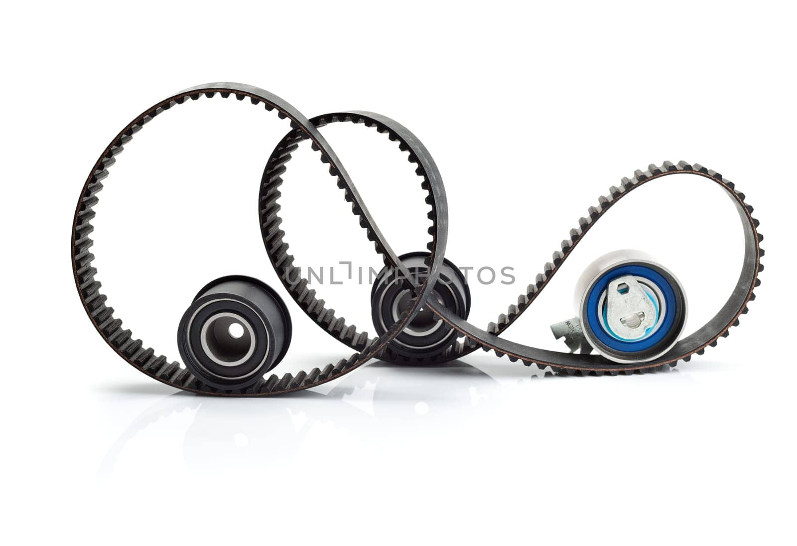Timing belt, two rollers and the tension mechanism. Isolate on white background.