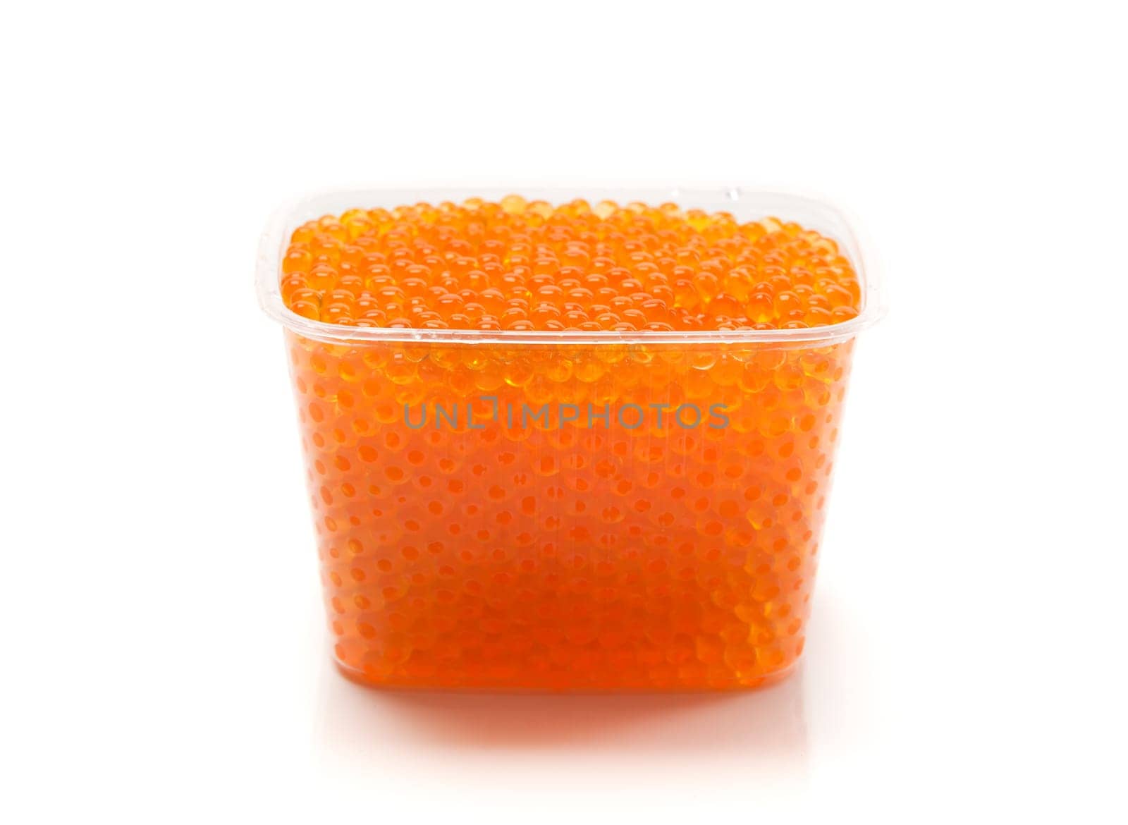 Red caviar in a plastic pot isolated on white background.