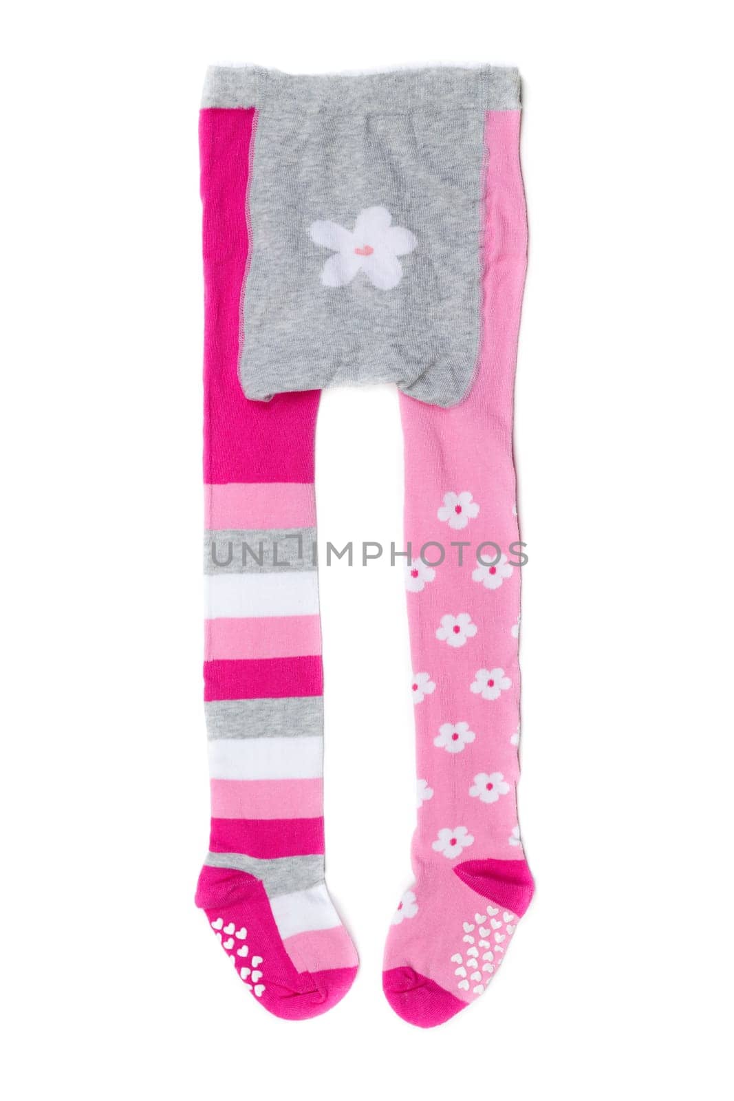 Pink children's tights. Isolate on white.