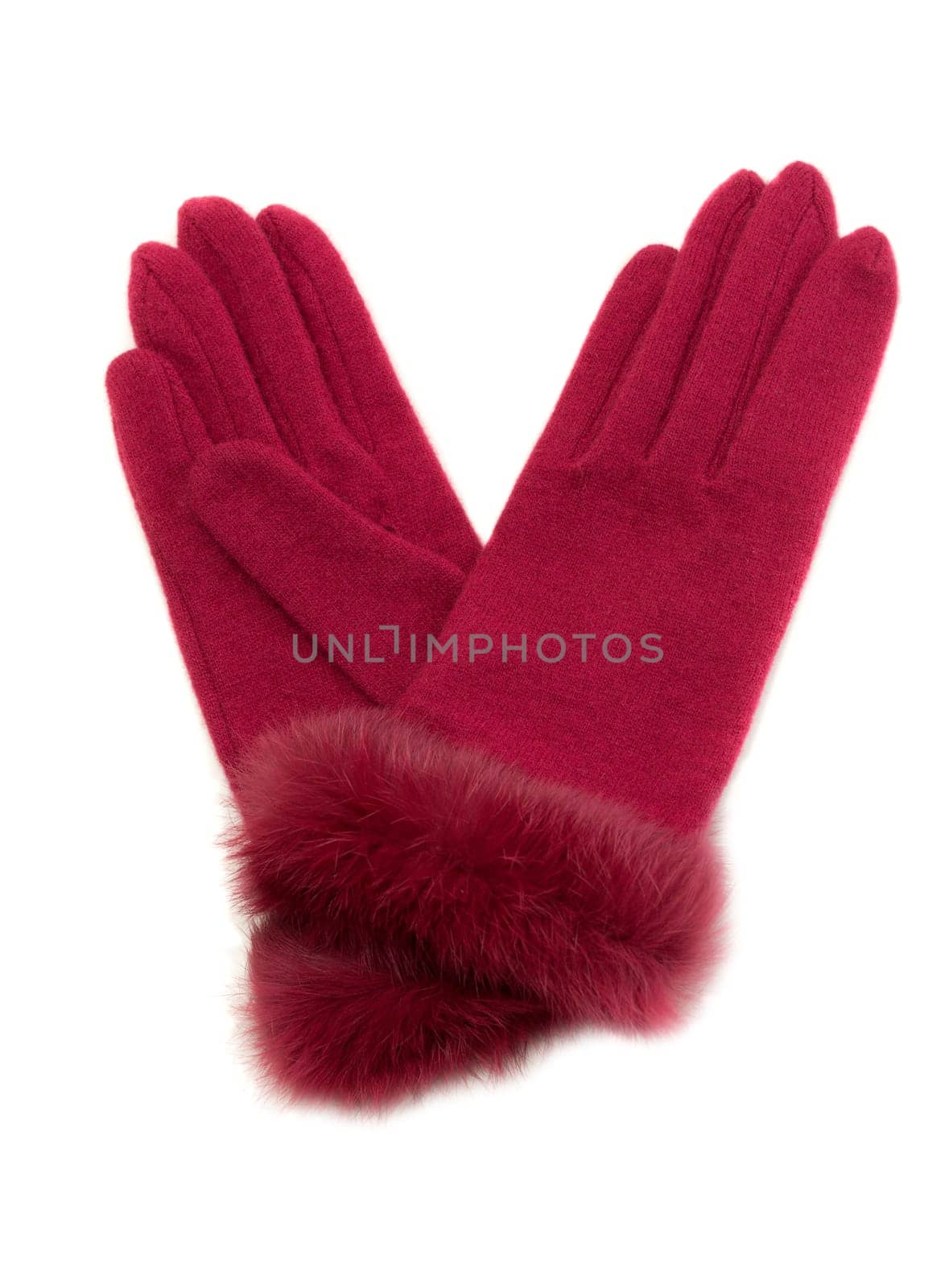 Crimson warm ladies' gloves with fur. Isolate on white.
