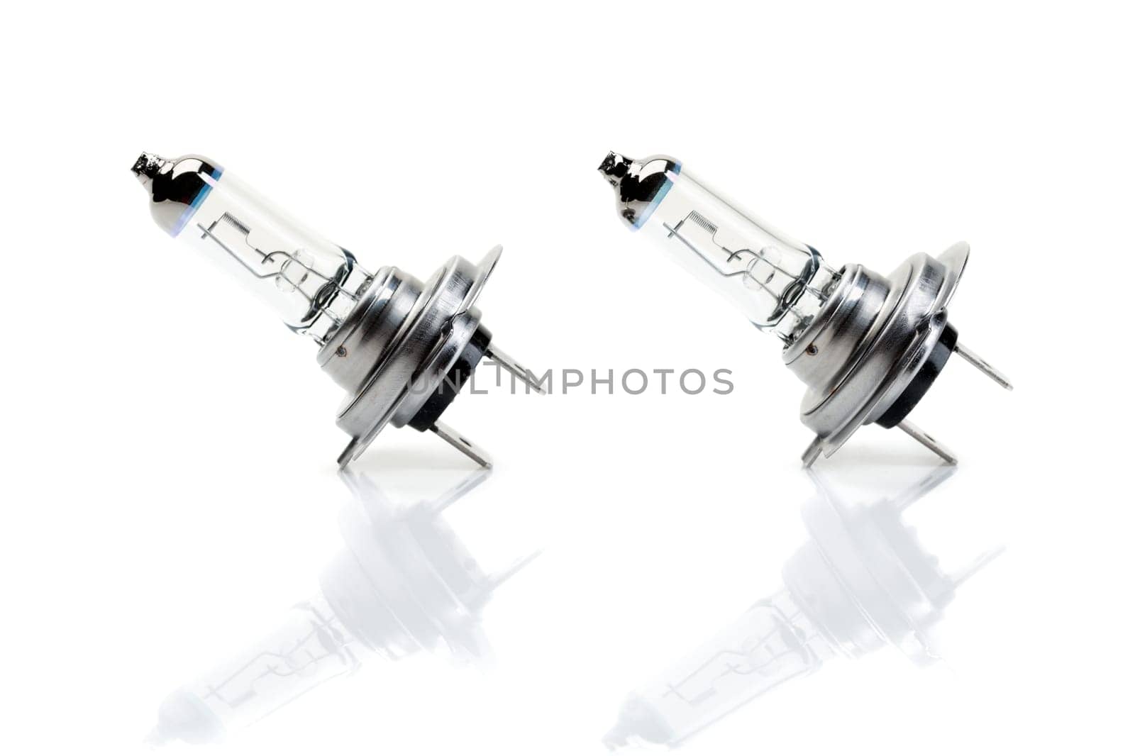Set beam bulb H7 with reflection on white background. Isolate.