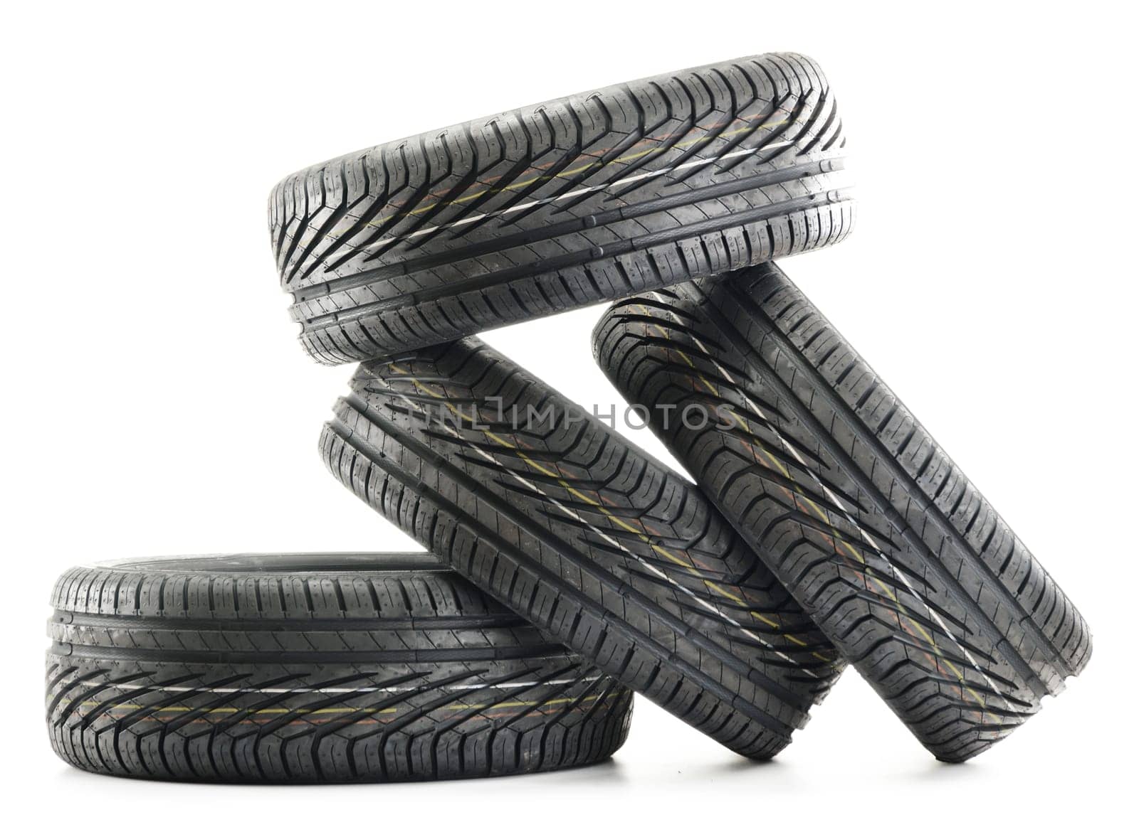 Four new black tires isolated on white background