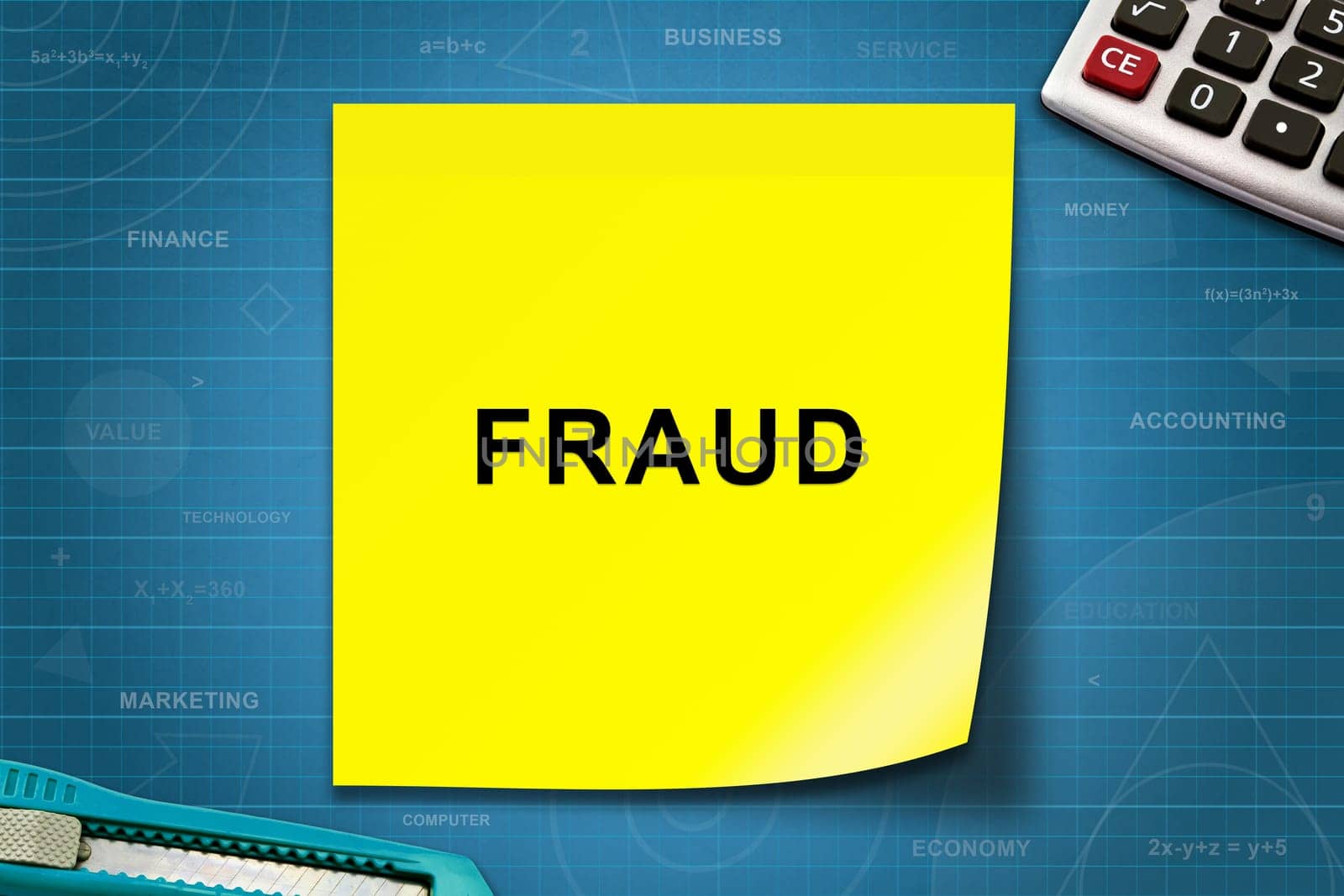 Fraud text on yellow note with graph paper