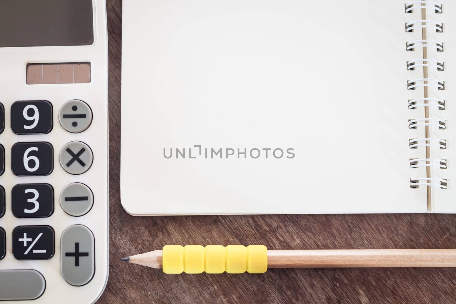 Open blank notebook with pencil, stock photo