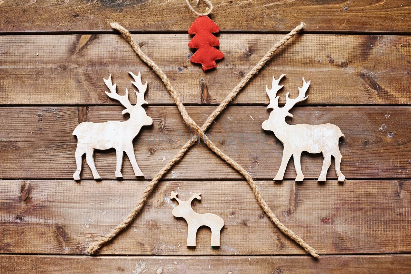 Three wooden xmas deers, toy firtree and two ropes