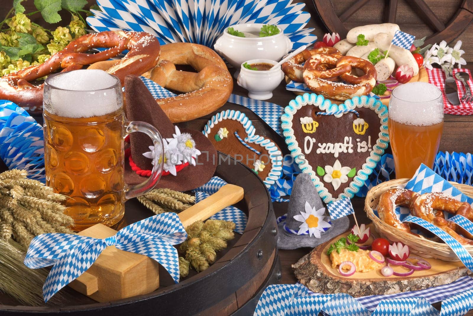 All typical Bavarian dishes in one picture. Pretzels,gingerbread,white sausage,obazda and beer.
