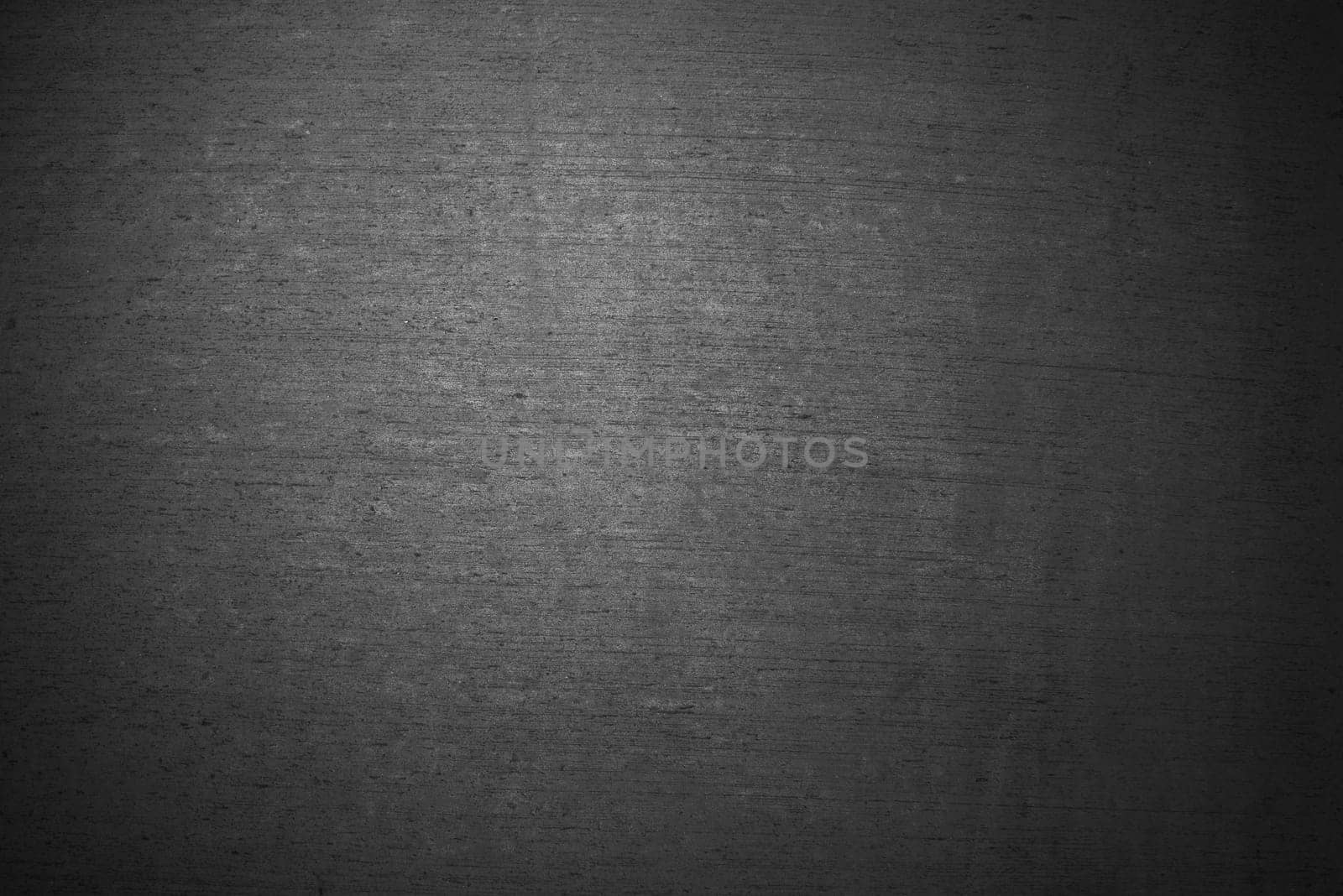 Background of a dark grey stone wall