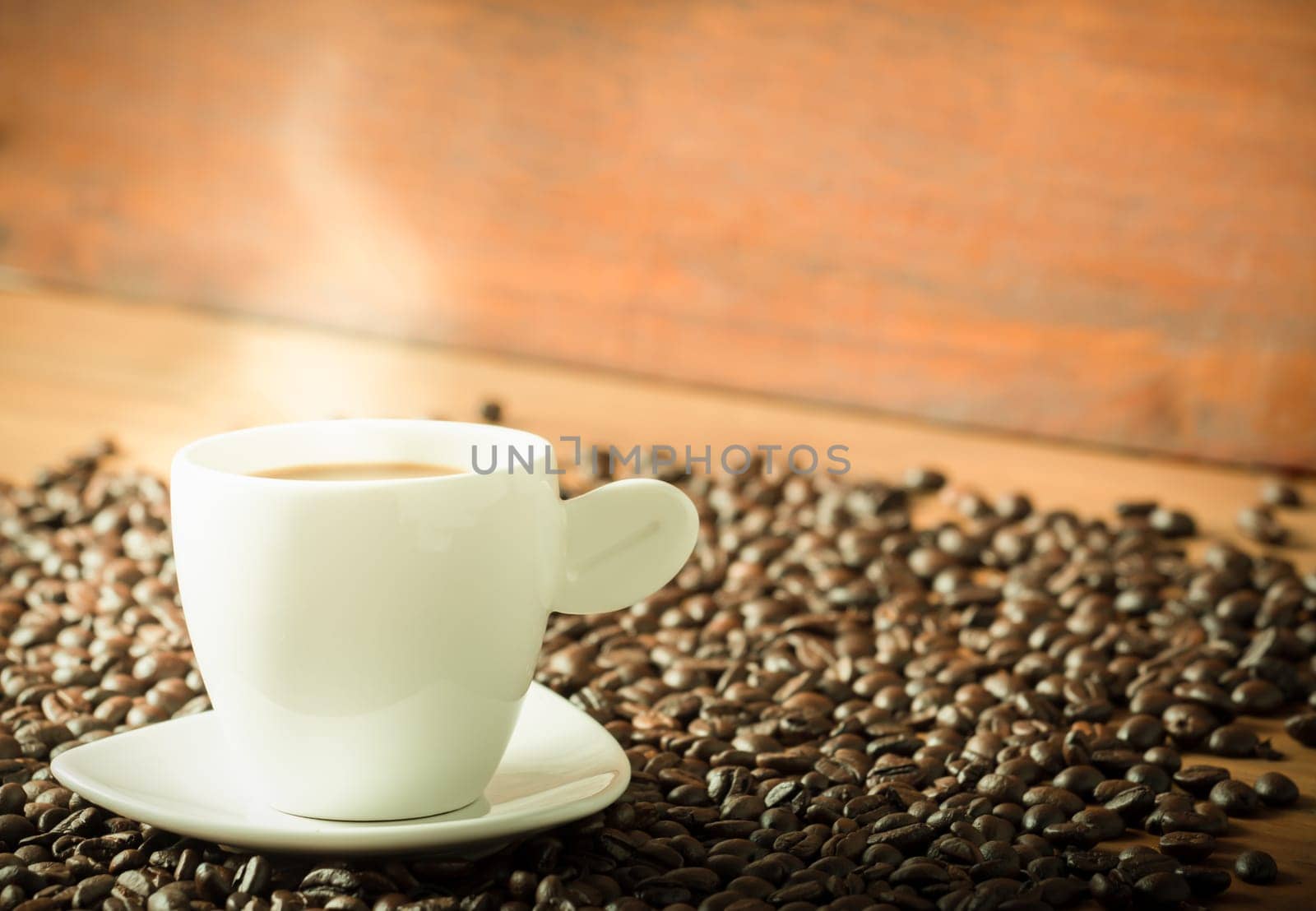 Coffee on teak wooden background, vintage
