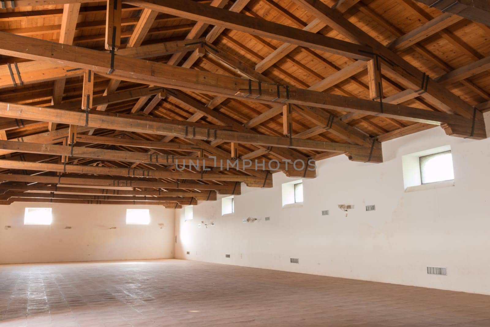 Barn with ancient ruins and roof made of wood