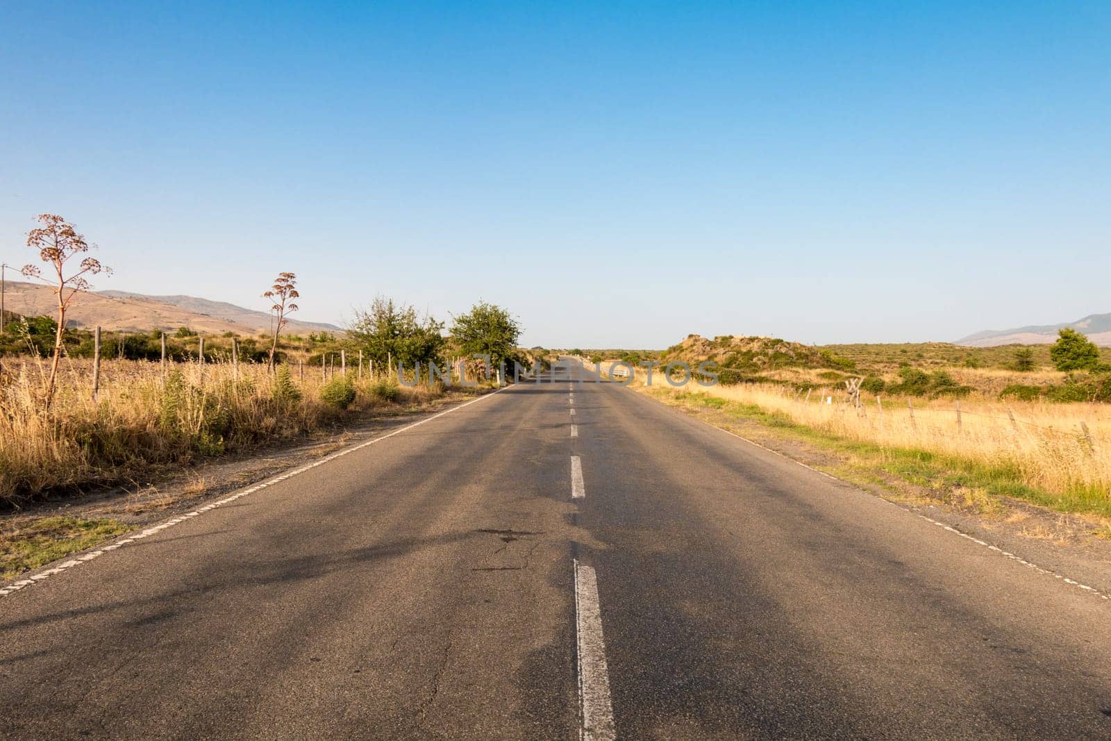 Sicilian Lonely Road in summer with hot degree