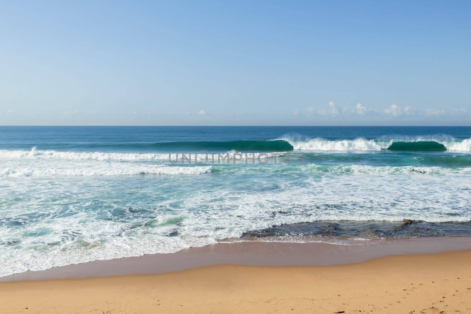 Ocean wave swells crashing water power coastline landscape.