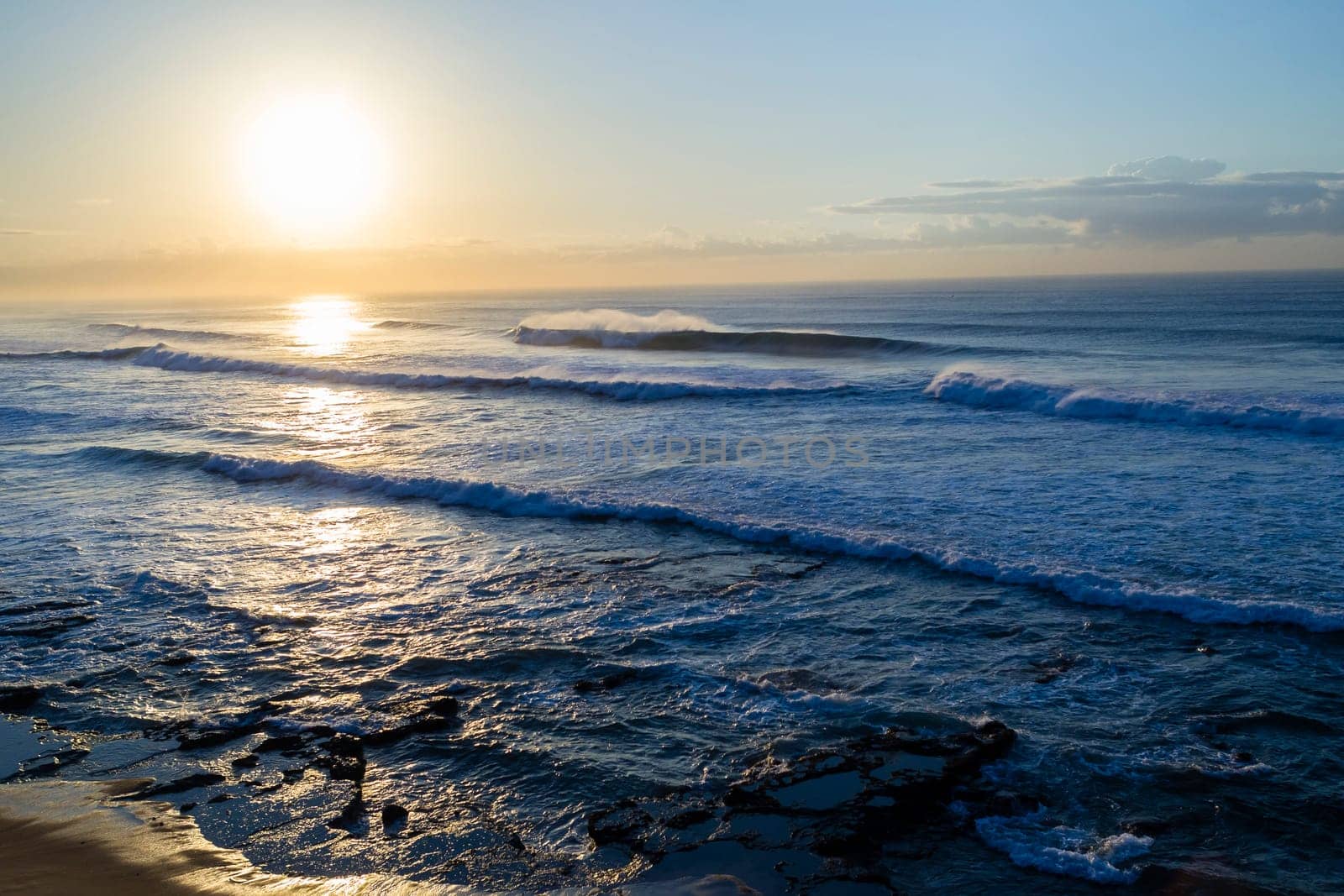 Ocean waves dawn sunrise crashing water power landscape