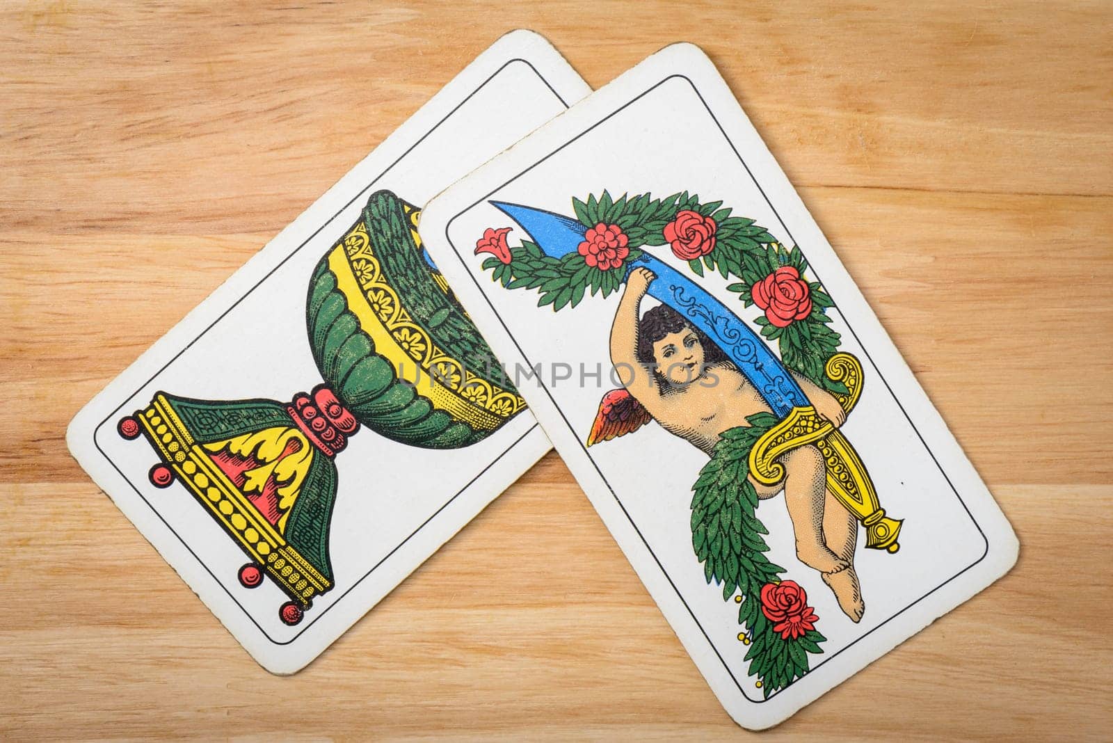 Aces italian card on a wood background
