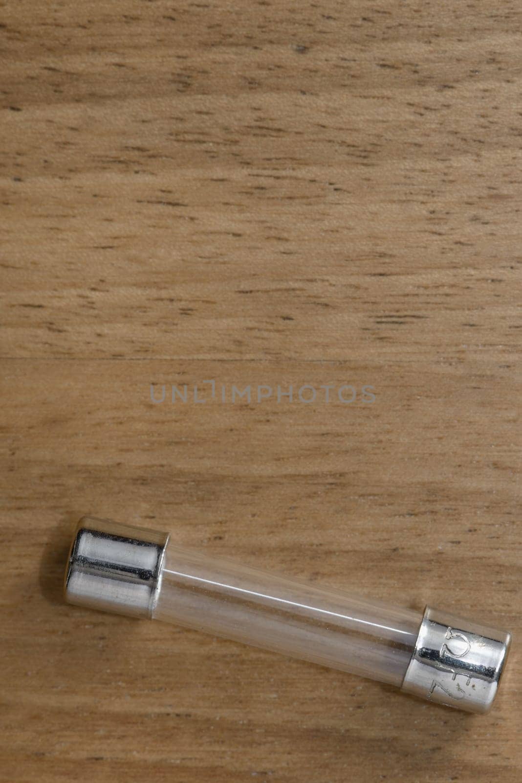A fuse on a wood table