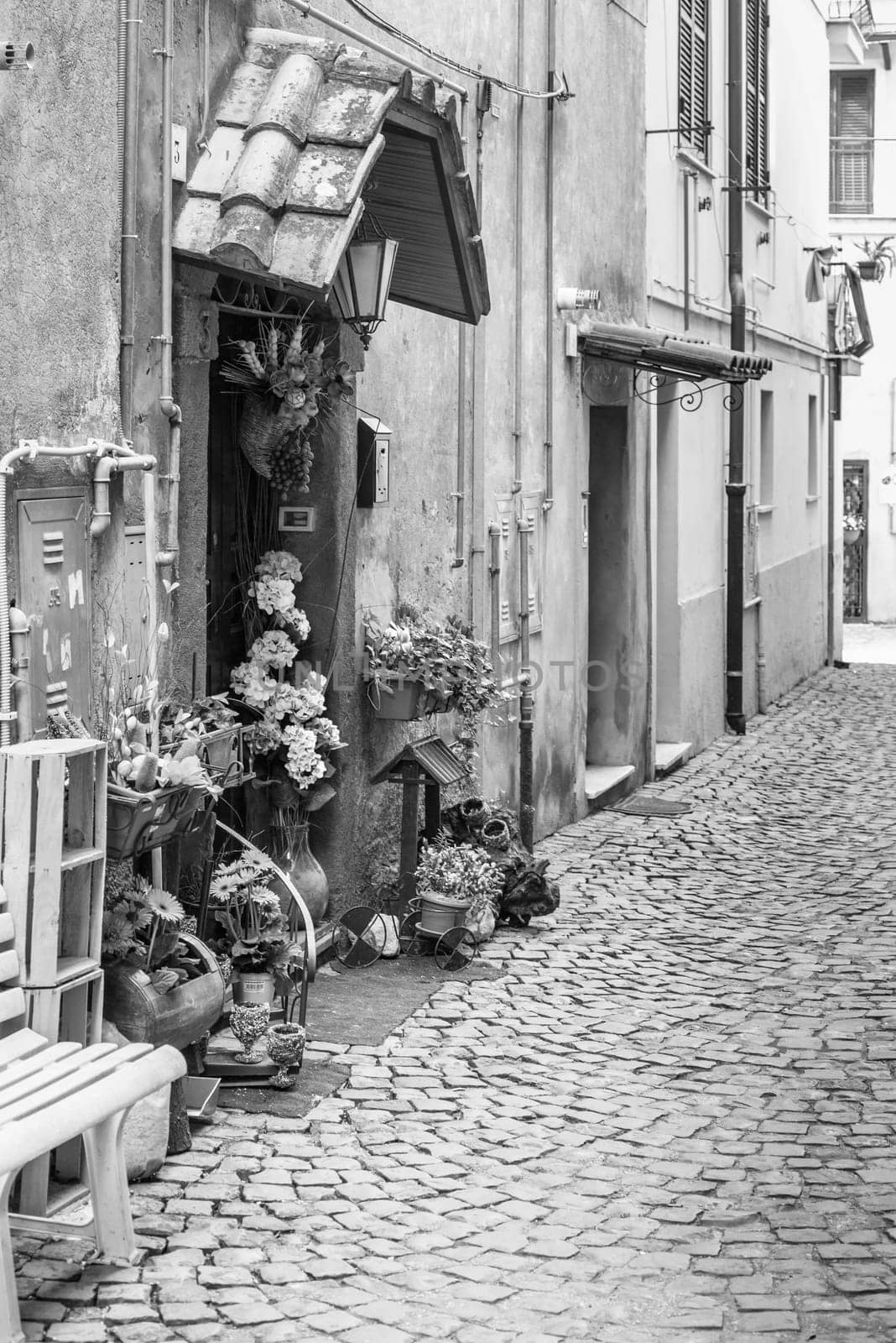 Nice  village street with flowers in Italy near Rome