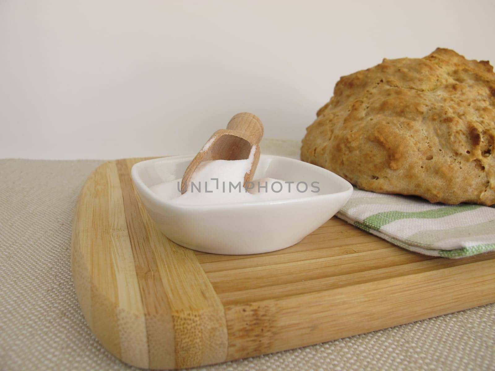 Homemade round soda bread and baking soda