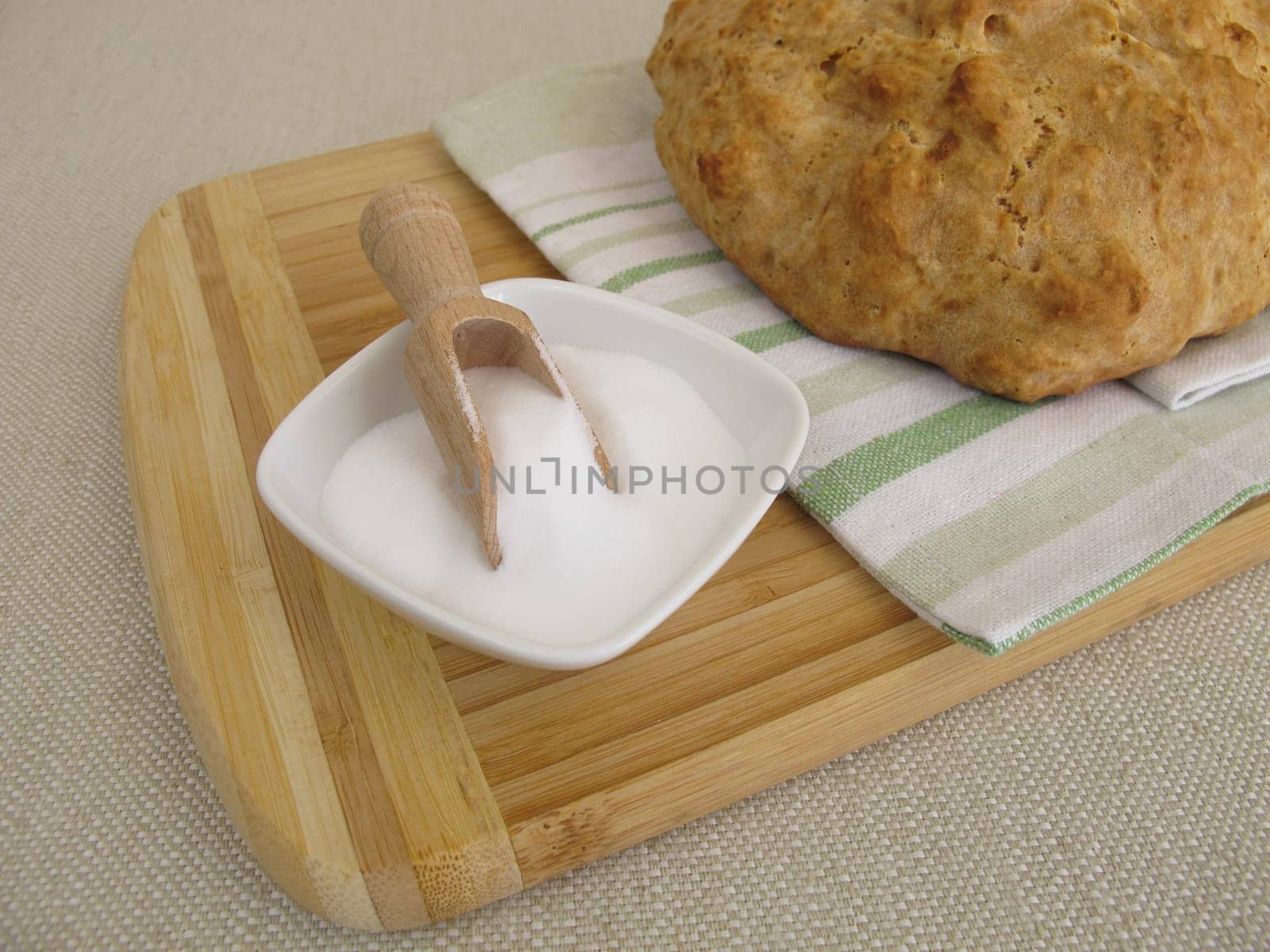 Homemade round soda bread and baking soda