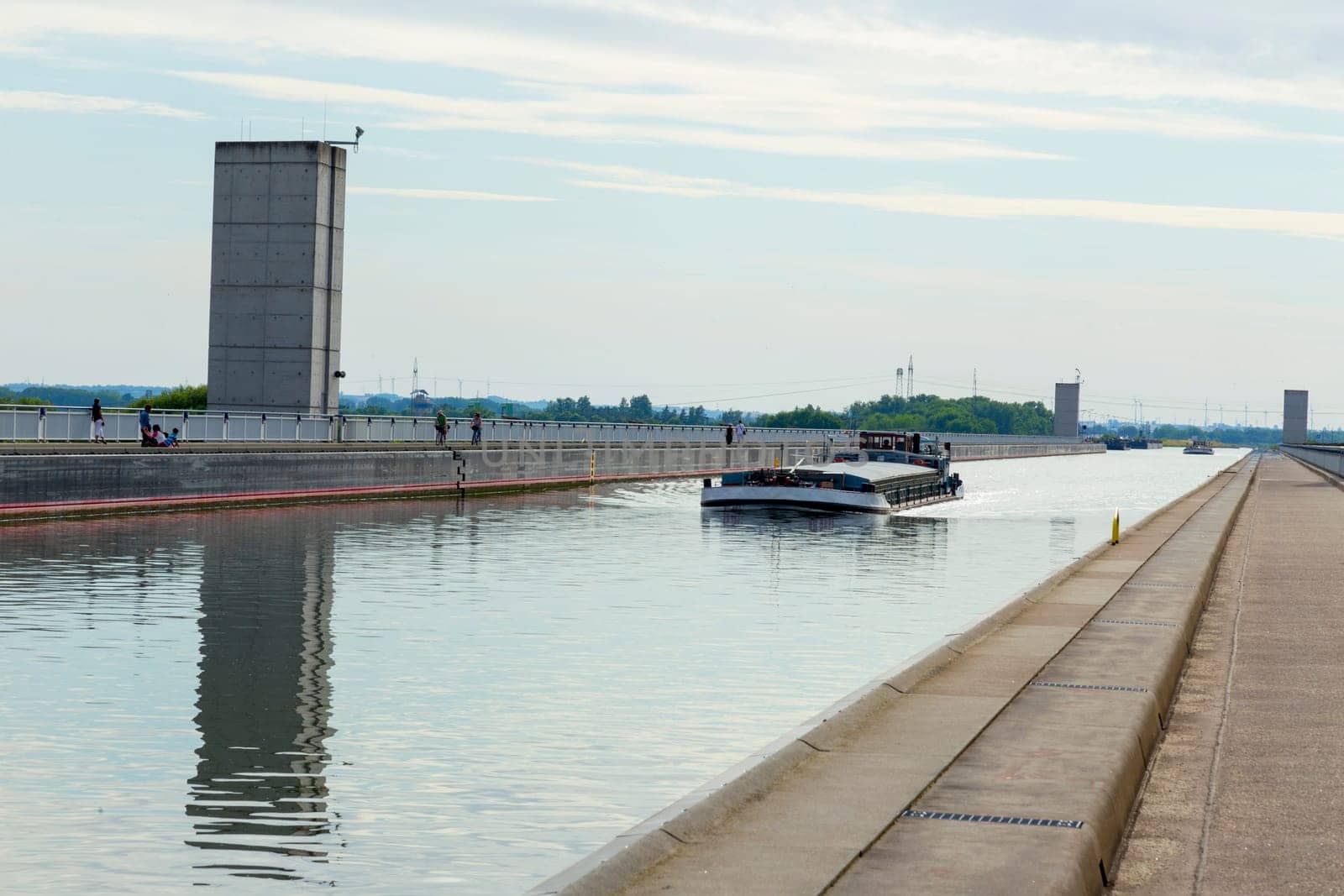 Cargo ship on the bridge of the Elbe-Havel Canal over the Elbe near Magdeburg