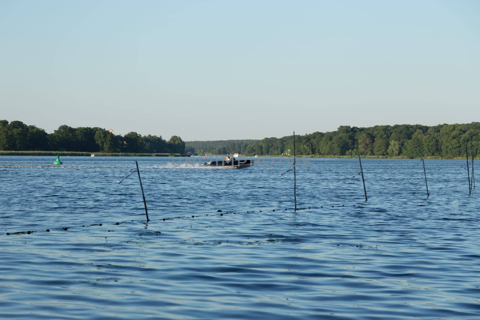 Motorboat at high speed on the Jungfernsee in Potsdam