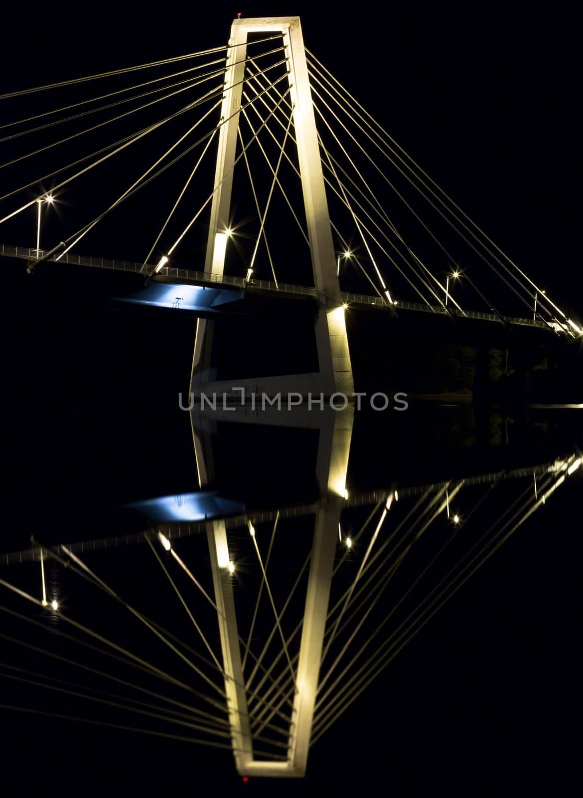 Cable Bridge in Umeå, Sweden. The "Kolbäcksbron"" with the river Umeälv in front."