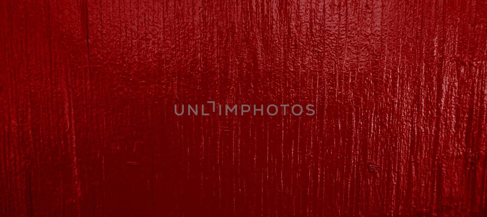 Wide red background with wrinkles and creases