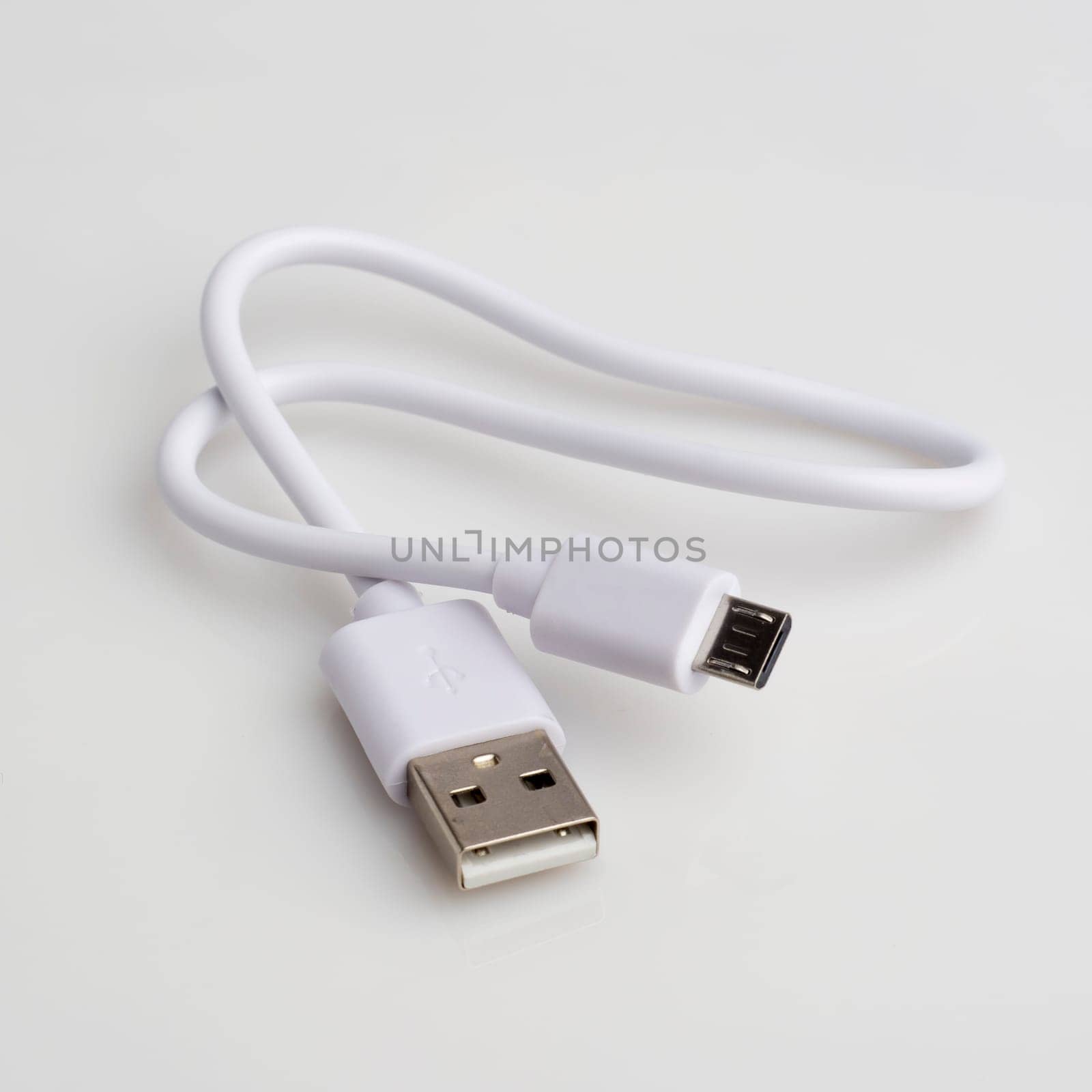 USB cable for data and charging on white