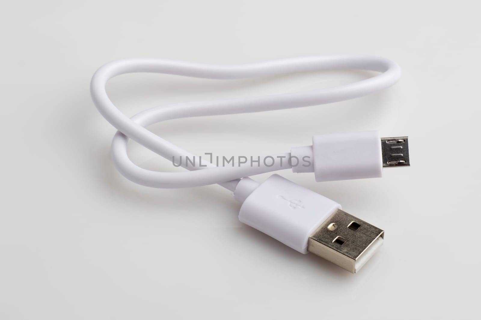 USB cable for data and charging on white