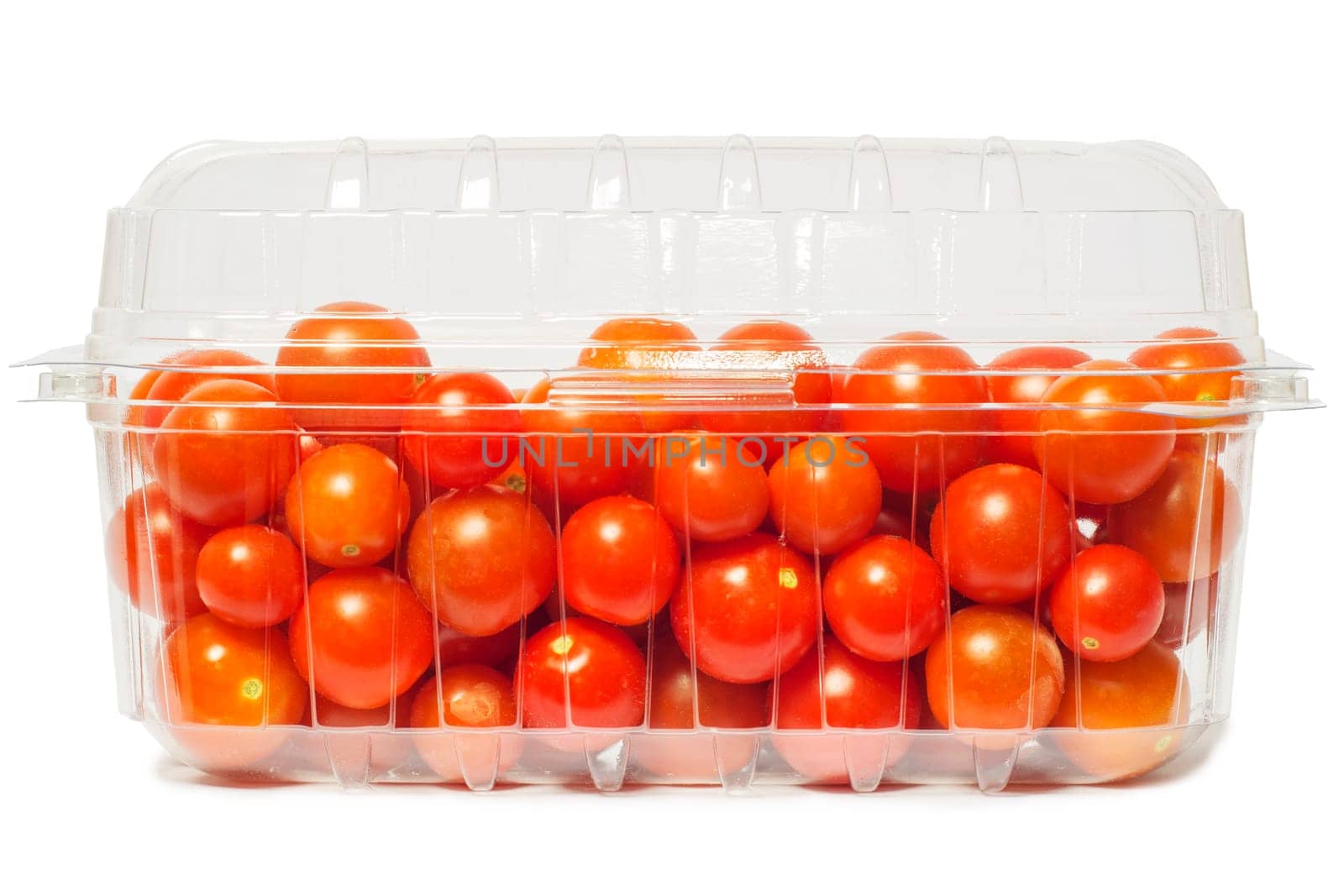 Cherry tomato in plastic package, studio isolated on white