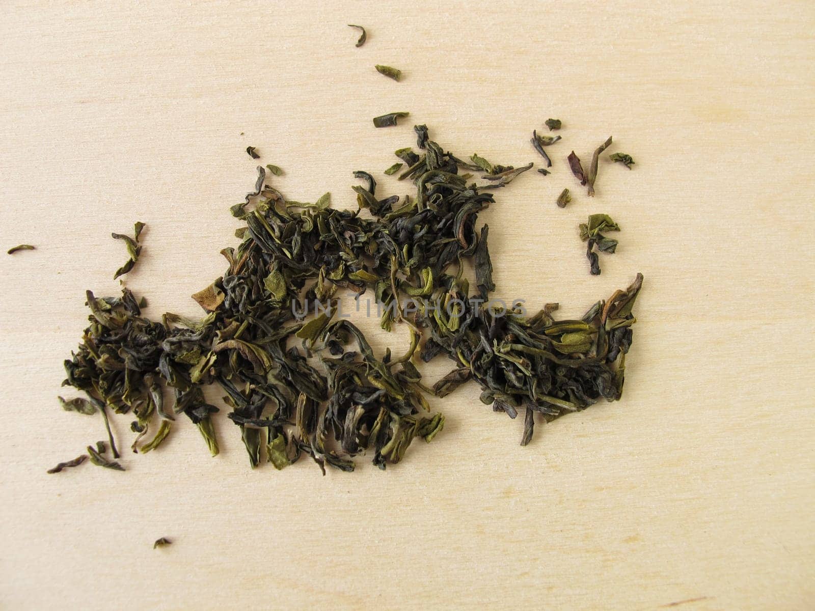 Darjeeling green tea on wooden background