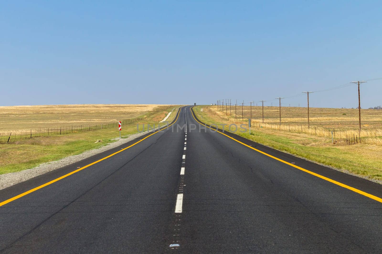 Road Straight highway through the rural countryside landscape