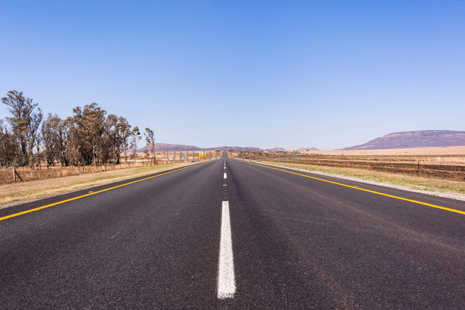 Road Straight highway through the rural countryside landscape