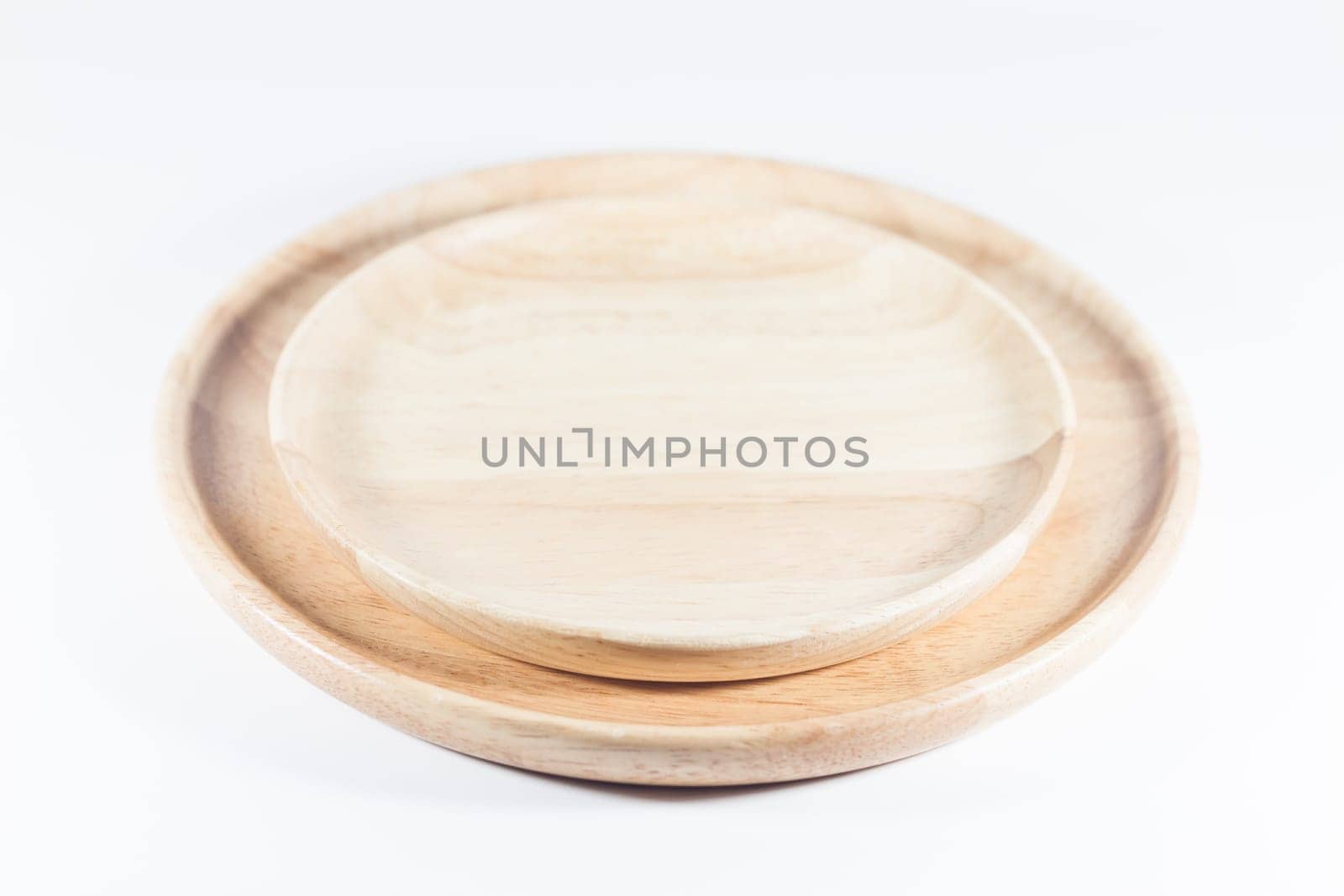 Wooden plate isolated on white background, stock photo