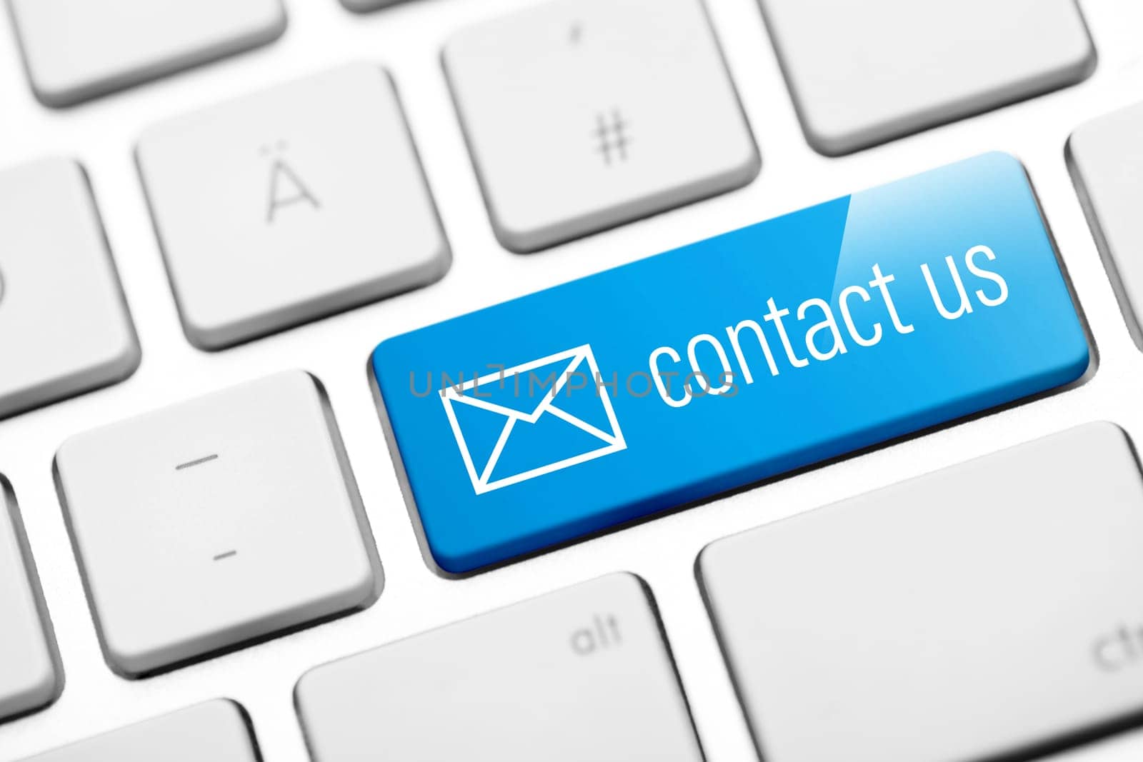 contact us key on white keyboard