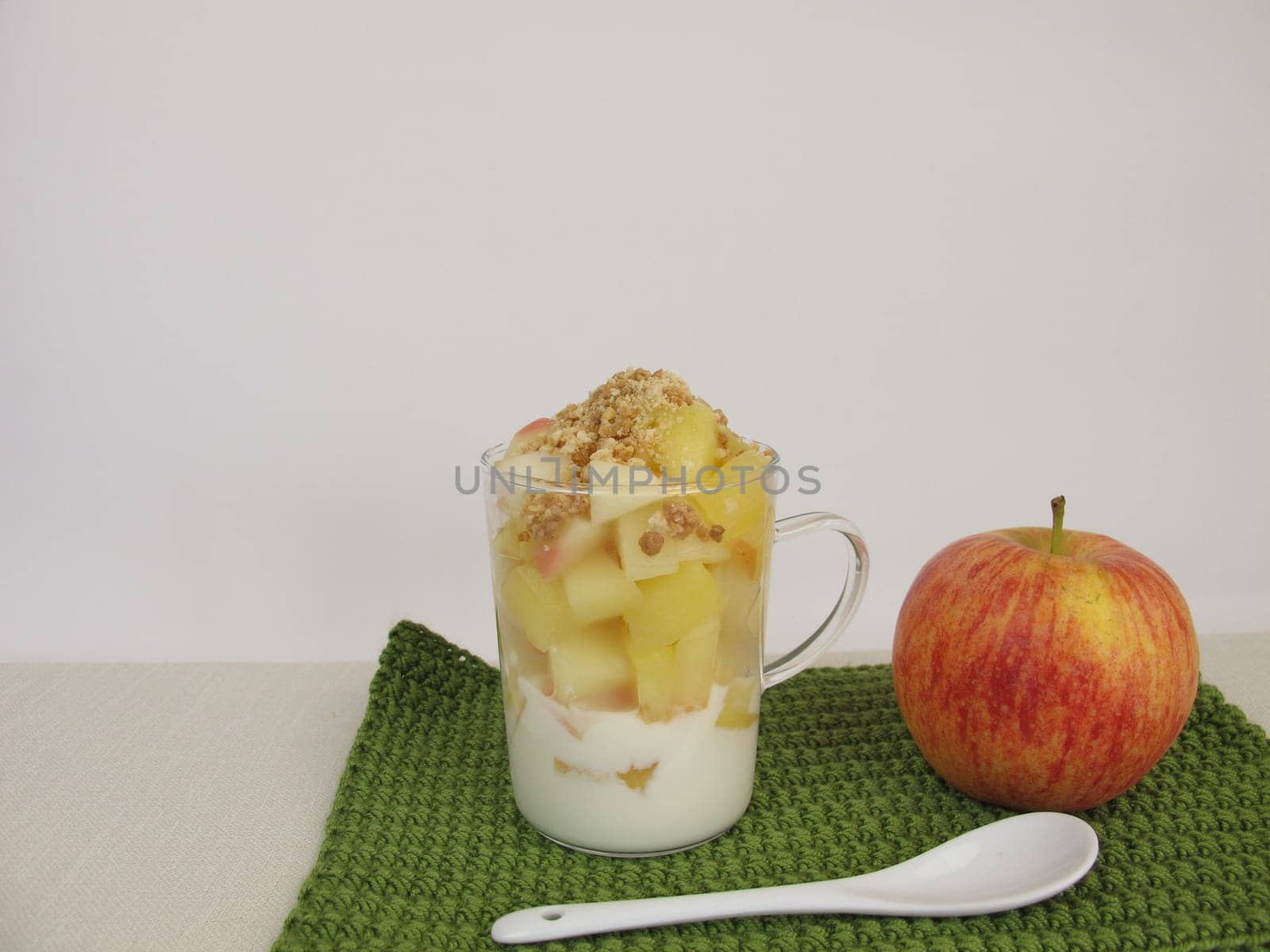 Crumble Mug Cake with apple,yoghurt,biscuit crumb sands and almond croquet