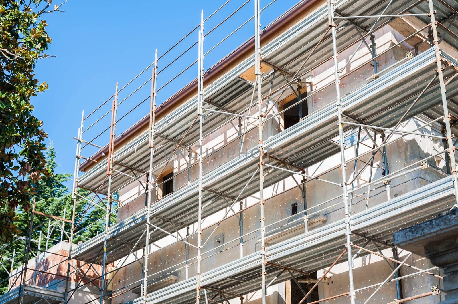 Building under construction with scaffolding