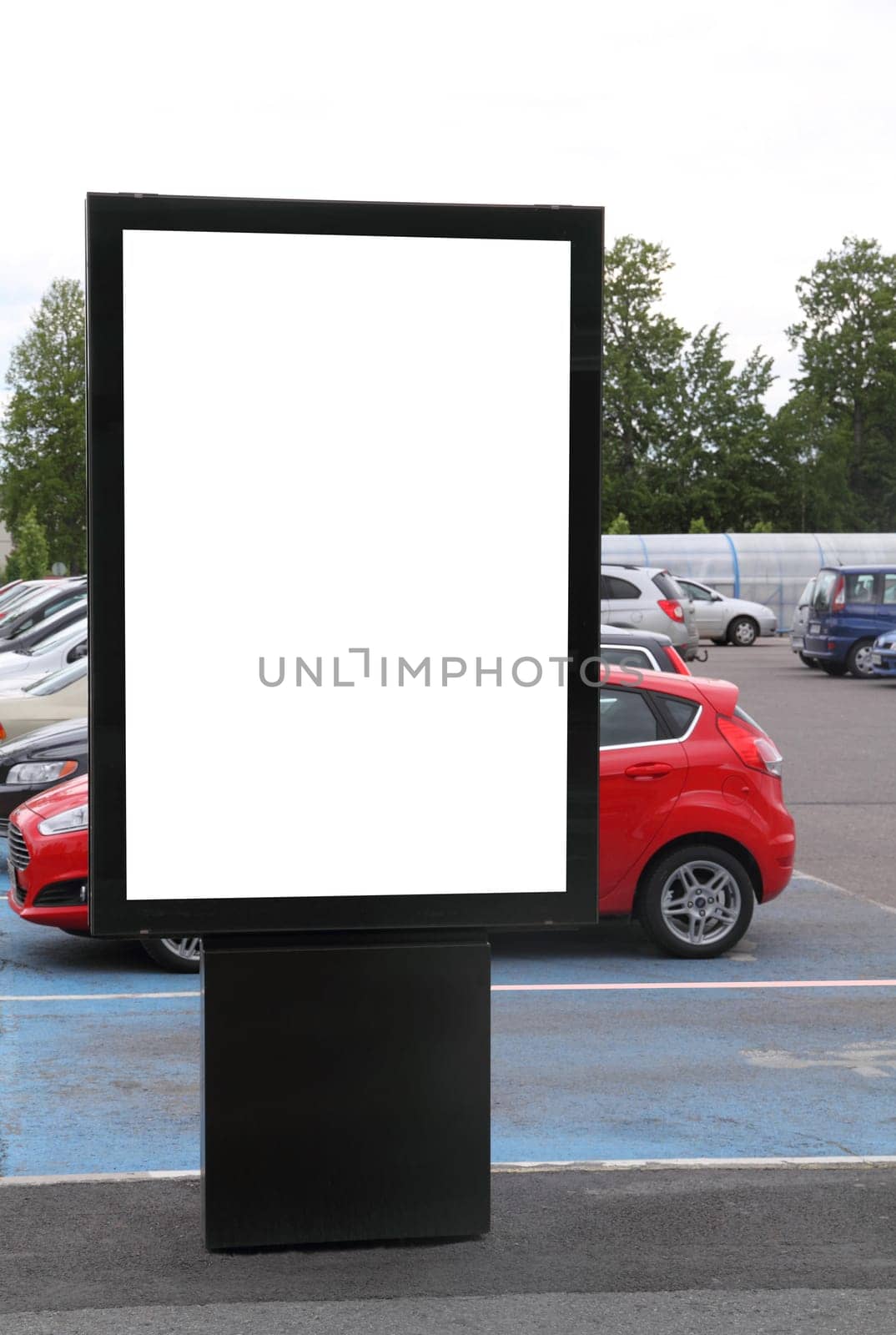 Blank billboard on a parking lot