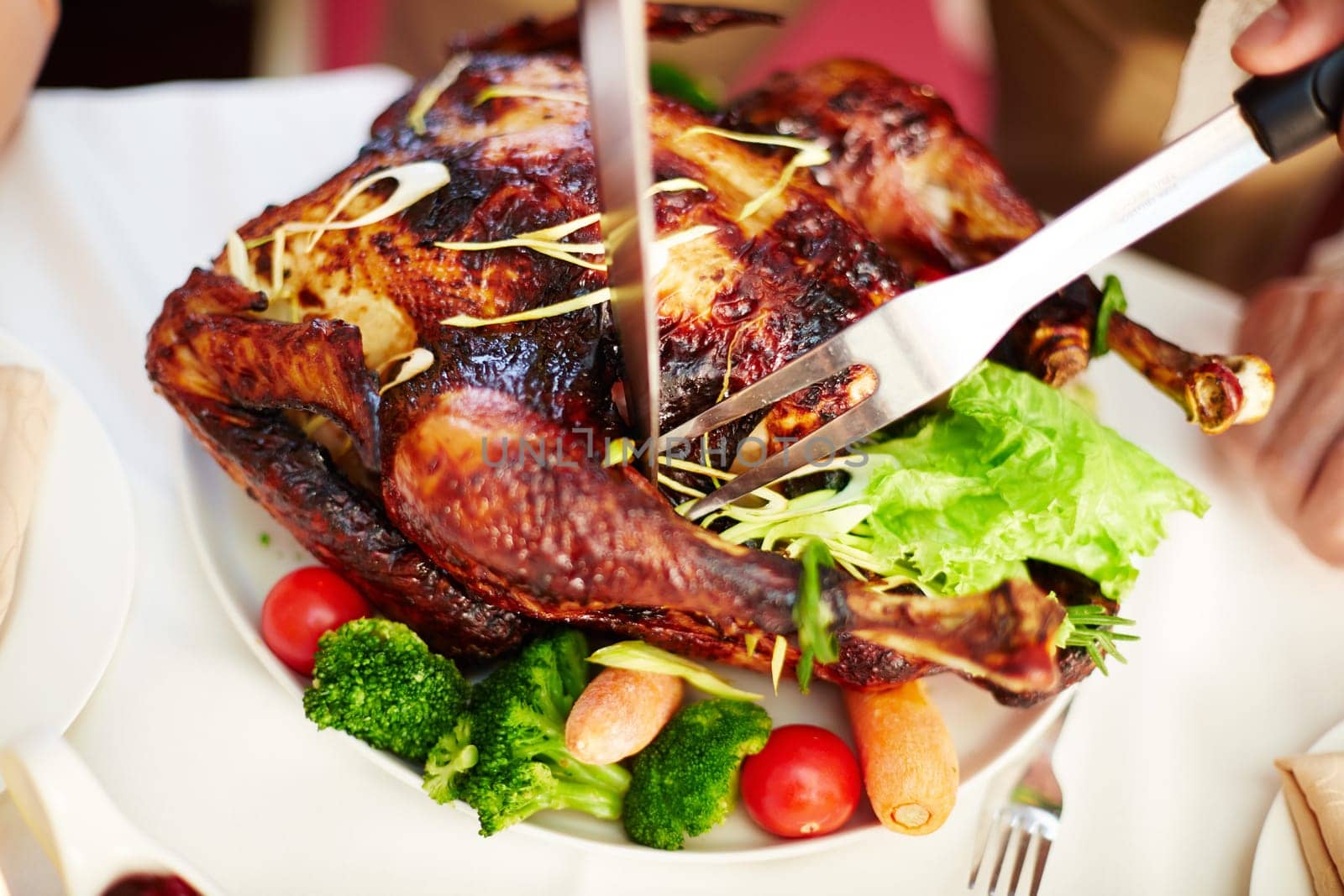 Homemade roasted turkey being cut