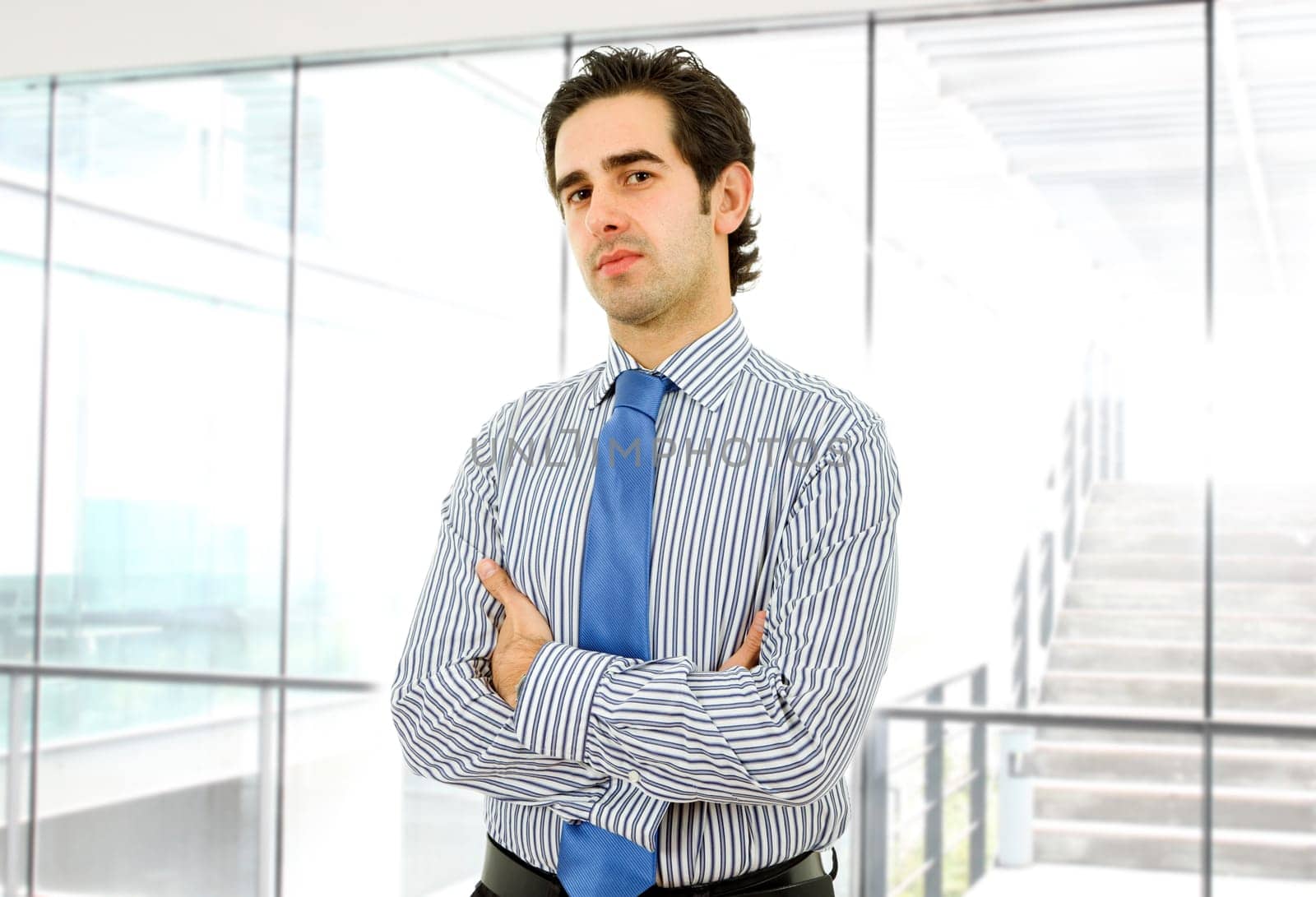 young business man portrait at the office