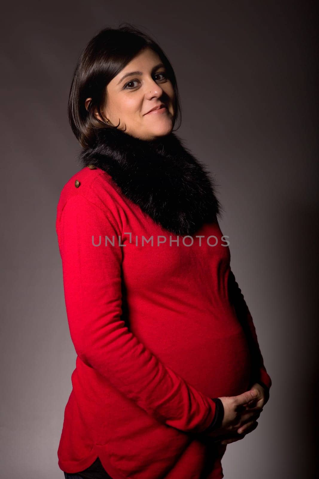 pregnant young woman studio picture
