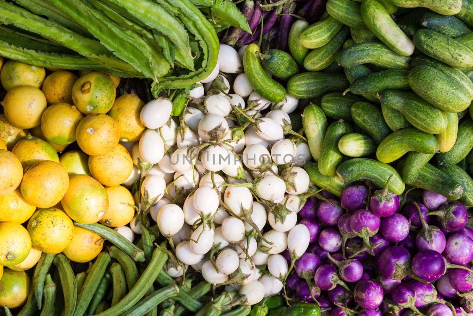 Exotic asian farmers market with various domestic colorful fresh fruits and vegetable.