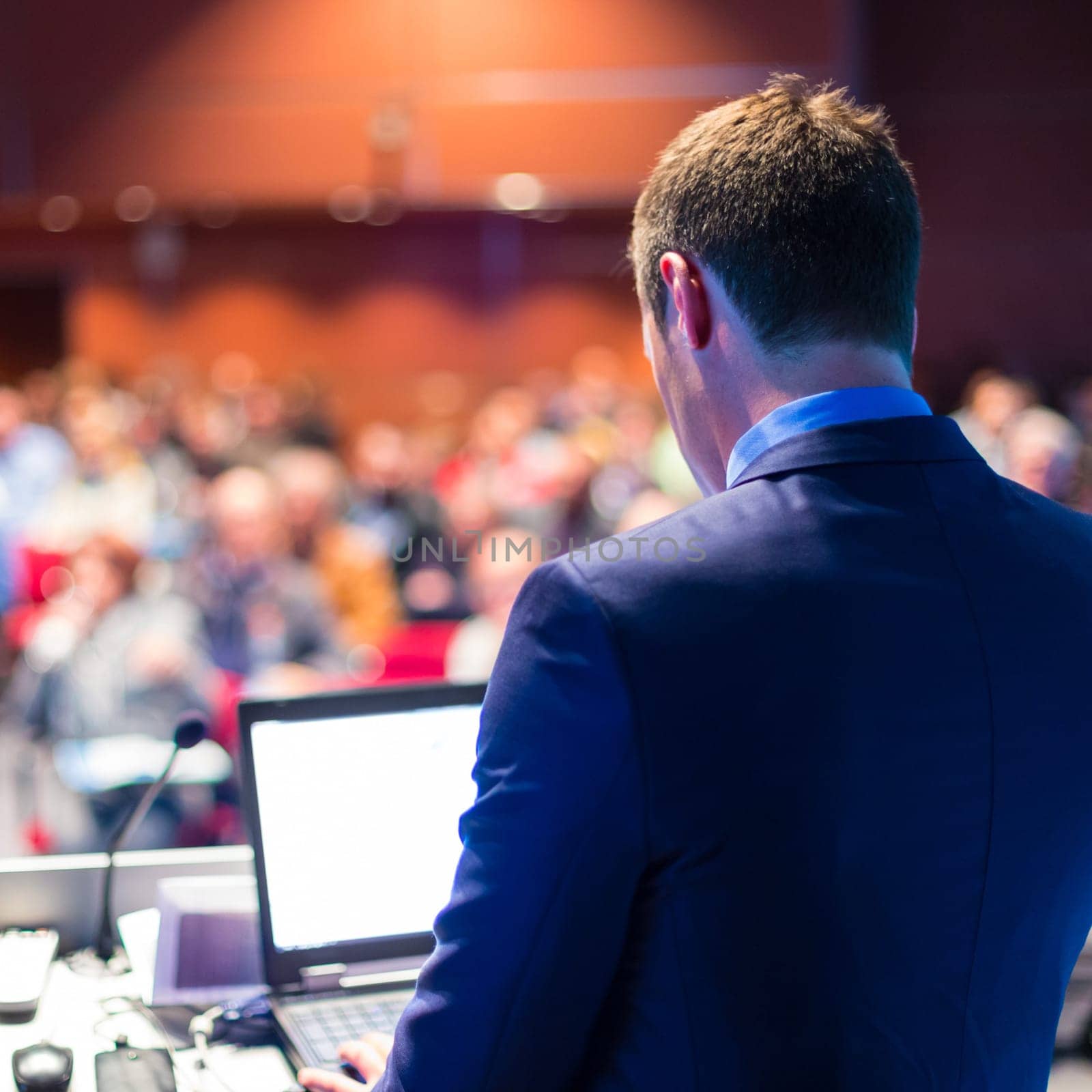 Speaker at Business Conference and Presentation. Audience at the conference hall.