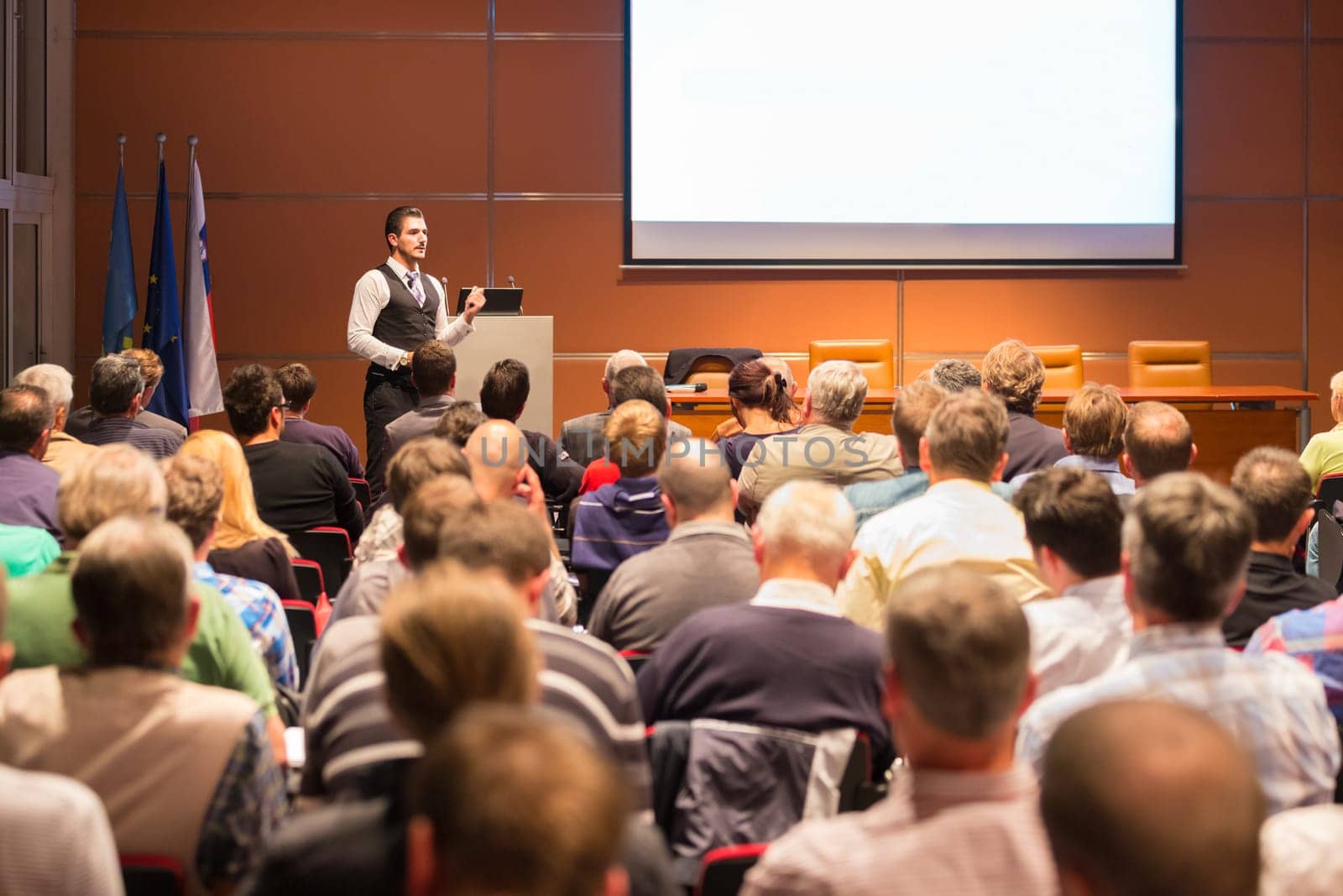 Speaker at Business Conference and Presentation. Audience at the conference hall. Business and Entrepreneurship.