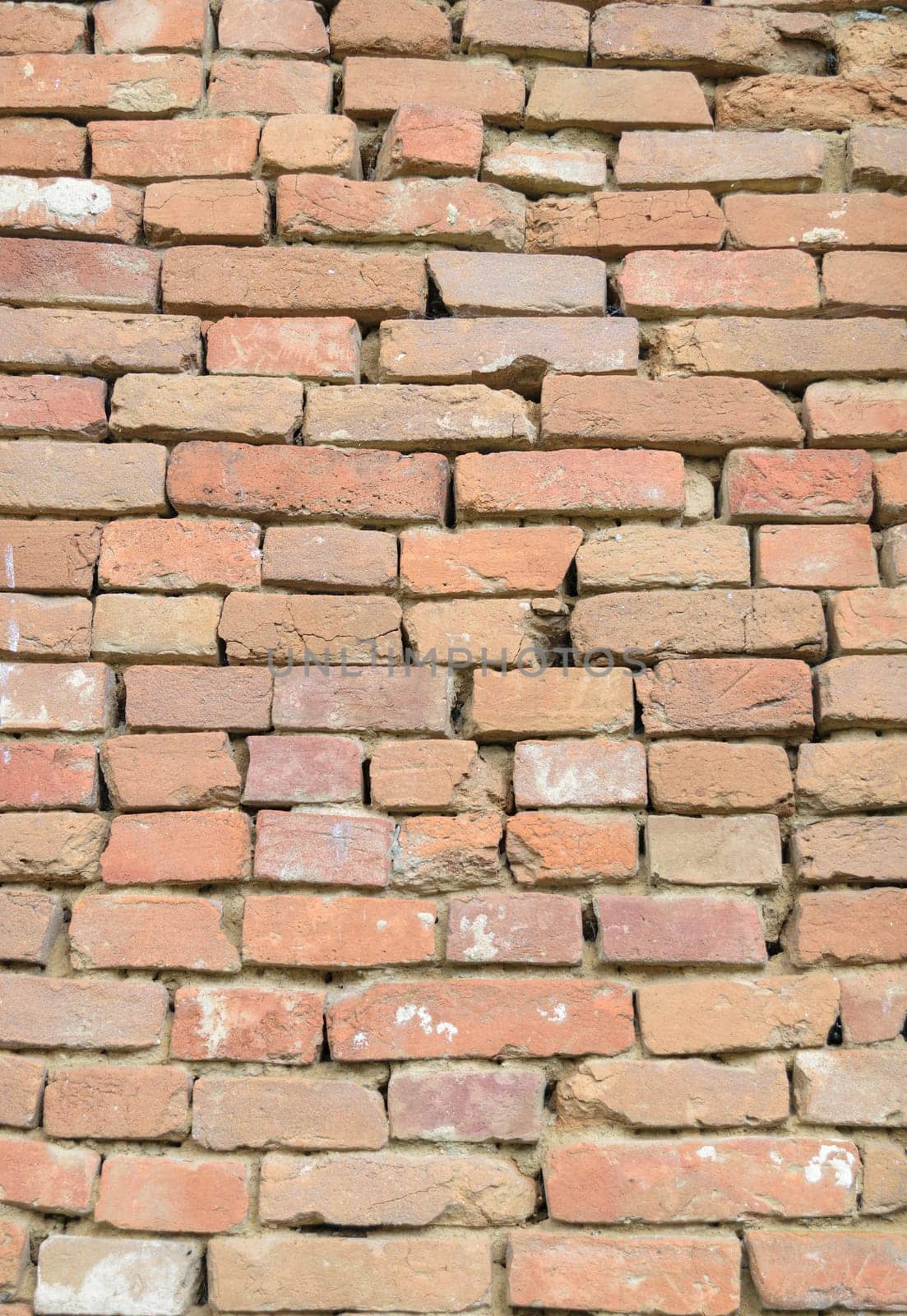 Masonry of red brick (fragment of old wall).