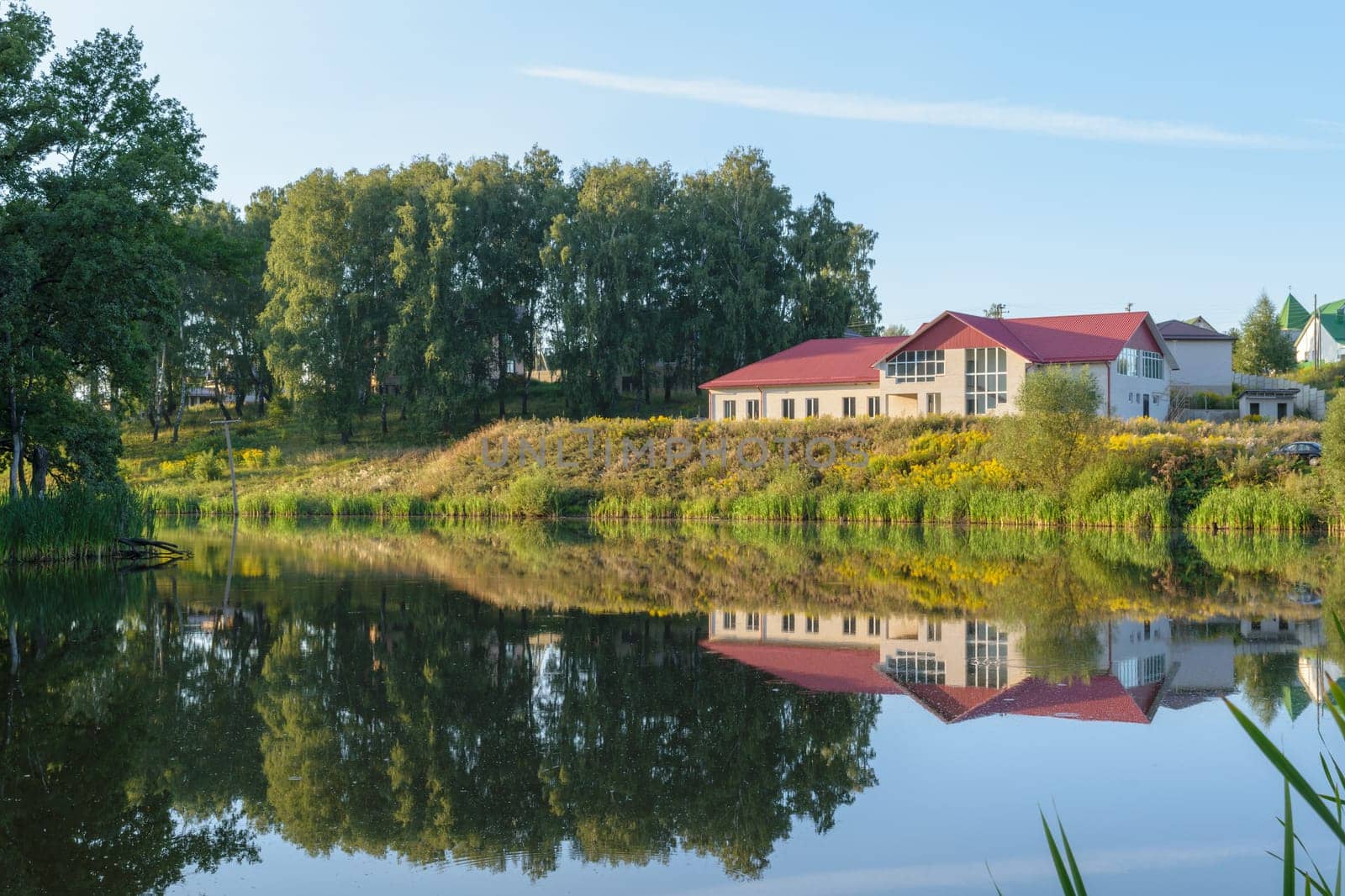 New brick house on the lake (pond)