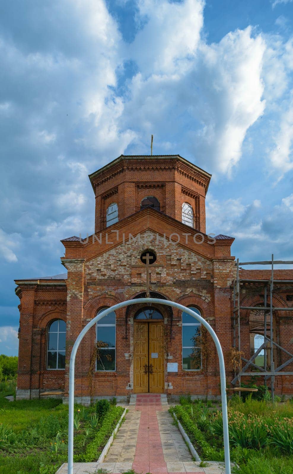 Entrance to the ancient Orthodox church of bricks in the countryside, situated on the restoration.