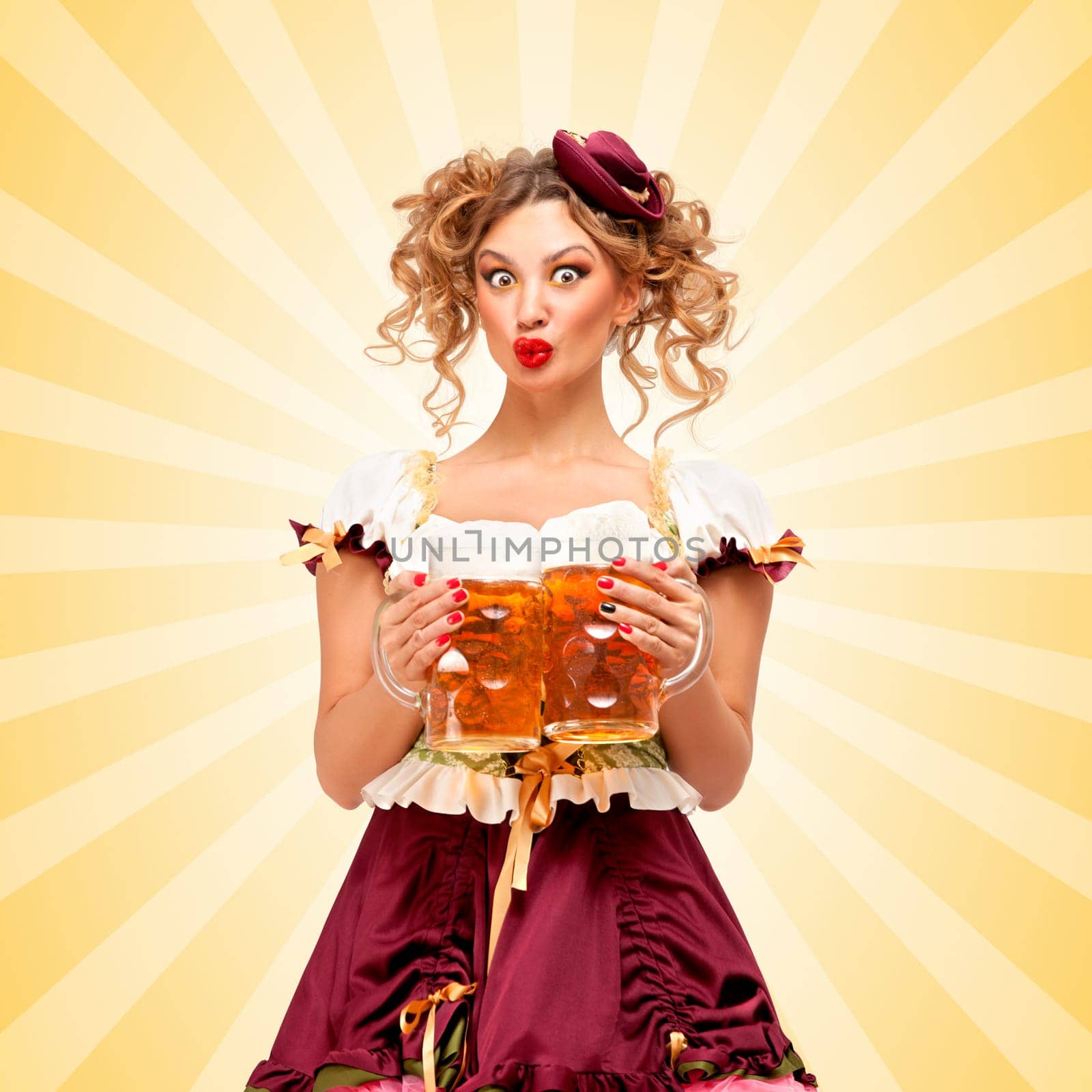 Beautiful surprised sexy Oktoberfest waitress wearing a traditional Bavarian dress dirndl holding two beer mugs on colorful abstract cartoon style background.