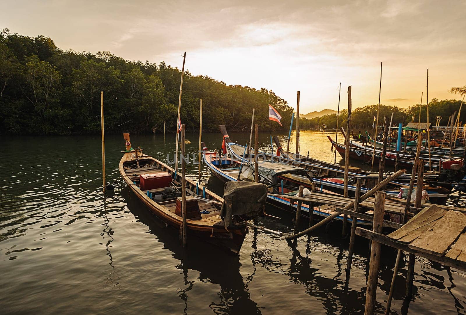 All fishing boat in the sea with color of sunlight, Phuket thailand